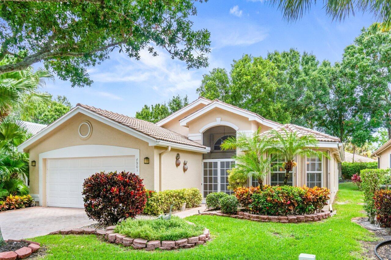 Beautifully updated 3 bedroom 2 bathroom home located in the highly sought-after active adult community of Valencia Lakes. This residence offers stunning curb appeal with professional landscaping and a 2-car garage. Step through the covered entry and double doors into a bright, open layout filled with natural light. The eat-in kitchen features charming bay windows, while the spacious living area with high ceilings flows seamlessly to a screened-in patio--perfect for outdoor entertaining. Enjoy peaceful garden views with no rear neighbors. The home boasts tile flooring throughout with wood-like laminate in the bedrooms, updated bathrooms, and an indoor laundry room with full-sized washer and dryer. The primary suite is a true retreat with a walk-in closet and an en-suite bath featuring a separate tub and shower.

Valenica Lakes is a vibrant, resort-style community offering an unmatched lifestyle of leisure and activity. Enjoy a newly designed contemporary clubhouse featuring a state-of-the-art fitness center, spacious craft and card rooms, billiards, and a stylish social hall/showroom for live entertainment and events. Outdoor amenities include resurfaced pickleball courts, USTA-level tennis facilities with league play, lap and resort-style pools, and a relaxing patio caf+¬. A wide array of clubs, shows, and social activities ensures there's always something to enjoy in this dynamic and engaging setting.