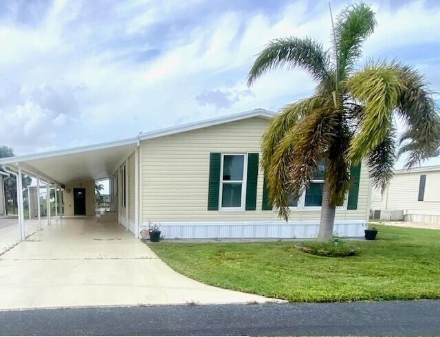 This home is located in Oasis Village, a desirable subdivision that has so much to do.   2 Beadrooms/2Baths, plenty of room for your loves ones to visit, a Florida Room overlooking the lake, with a hot tub.   Room to park your Boat, and Lake Okeechobee is right across the street!    The Community has lots of activities,  A pool, shuffleboard, pickleball, and many planned activities throughout the month.   This is a perfect place to stay active or rest and relax as much as you would like.   Close to everything, and very convenient .   This home is ready for yu to move in!
