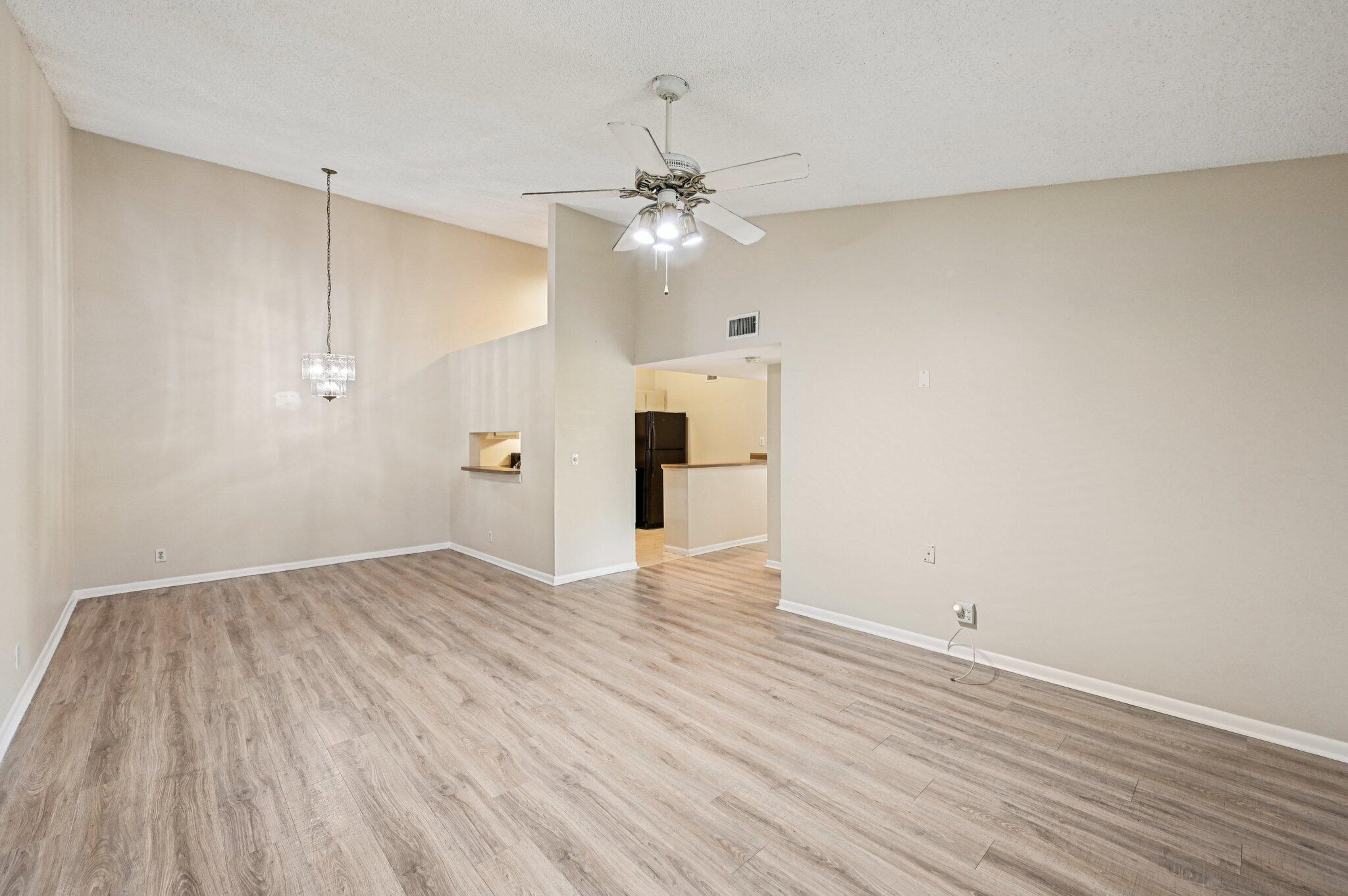 UPDATED FLOORING - MOVE-IN READY! Second Floor Corner Unit - Split Bedroom floor plan, NO CARPET, LARGE 980sf 2 BEDS, 2 FULL BATHS, Living / Dining room VAULTED CEILINGS, Lots of (original) kitchen cabinets. Master Bed w/Ensuite Full Bath & Walk-in Closet. Enjoy outdoor living, screened patio, & storage closet, washer & dryer in unit. 2 parking spots, ACCORDION SHUTTERS. Clubhouse, Tennis courts, Community Pool, BBQ and Picnic area. HOA INCLUDES: WATER, Trash, Pest Control, Lawn Care. Available Boat/RV storage area. Minutes drive to: Beaches, Shopping, Dining, Parks, Golf, Abacoa Town Center, near I95 / Turnpike, and of course our A-Rated Jupiter Schools! CALL NOW to schedule your private showing.