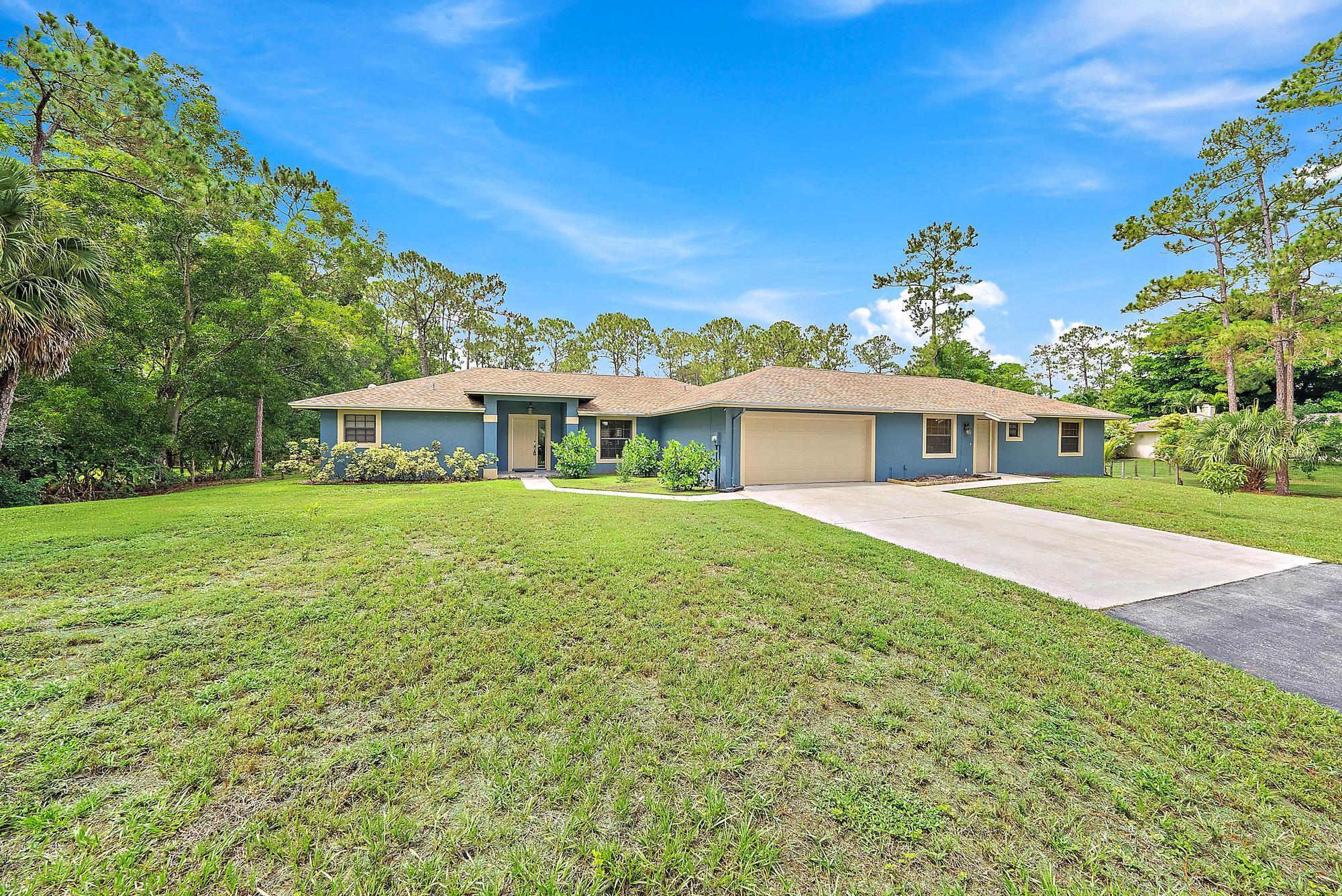 Well-maintained CBS home built in 2002, offering a unique 5 bed/3 bath layout with a versatile setup. Main home features 3BR/2BA and an attached 2BR/1BA suite with private entrance, full kitchen -- ideal for in-laws, guests, or rental income. Brand new roof (2025), new carpet in all bedrooms, 2-car garage. Enjoy a private pool with an enormous deck, perfect for entertaining. Great opportunity for multi-generational living or investment. Convenient location, move-in ready. Must see!