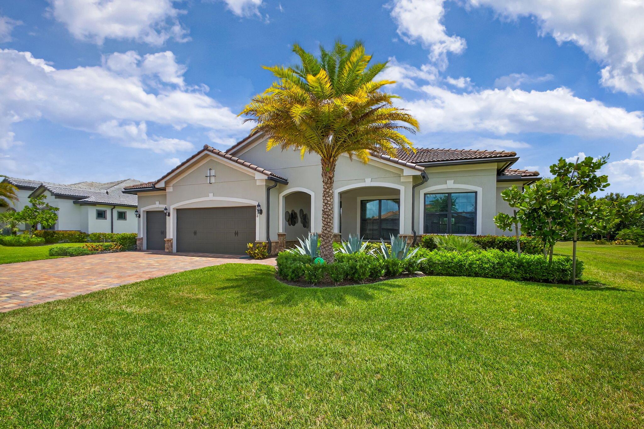 Unparalleled Elegance in this 2022, 4 Bedroom, 3 Bathroom with Den/Office Home on a Large Spacious Lot in the Prestigious Ancient Tree Community. This Distinguished Residence is the Epitome of Luxury Florida Living, Perfect for both Indoor and Outdoor Entertaining. A Well Appointed Chef's Kitchen Features Top of the Line Stainless Steel Kitchen Aid Appliances, Gas Range, Custom Island, Upgraded Cabinetry and Wine Bar. An Open Floor Plan Accents a Great Room filled with Stylish Designer Finishes like a Coffered Ceiling, Porcelain Floors and Zero Corner Sliders that lead into a Screened Lanai complete with Breathtaking Sunsets.The Primary Suite is Adorned with Spacious His & Hers Walk-In Closets with Built-Ins and a Lavish Bathroom. This Beautiful Home Truly Has it All, Move in Ready!!