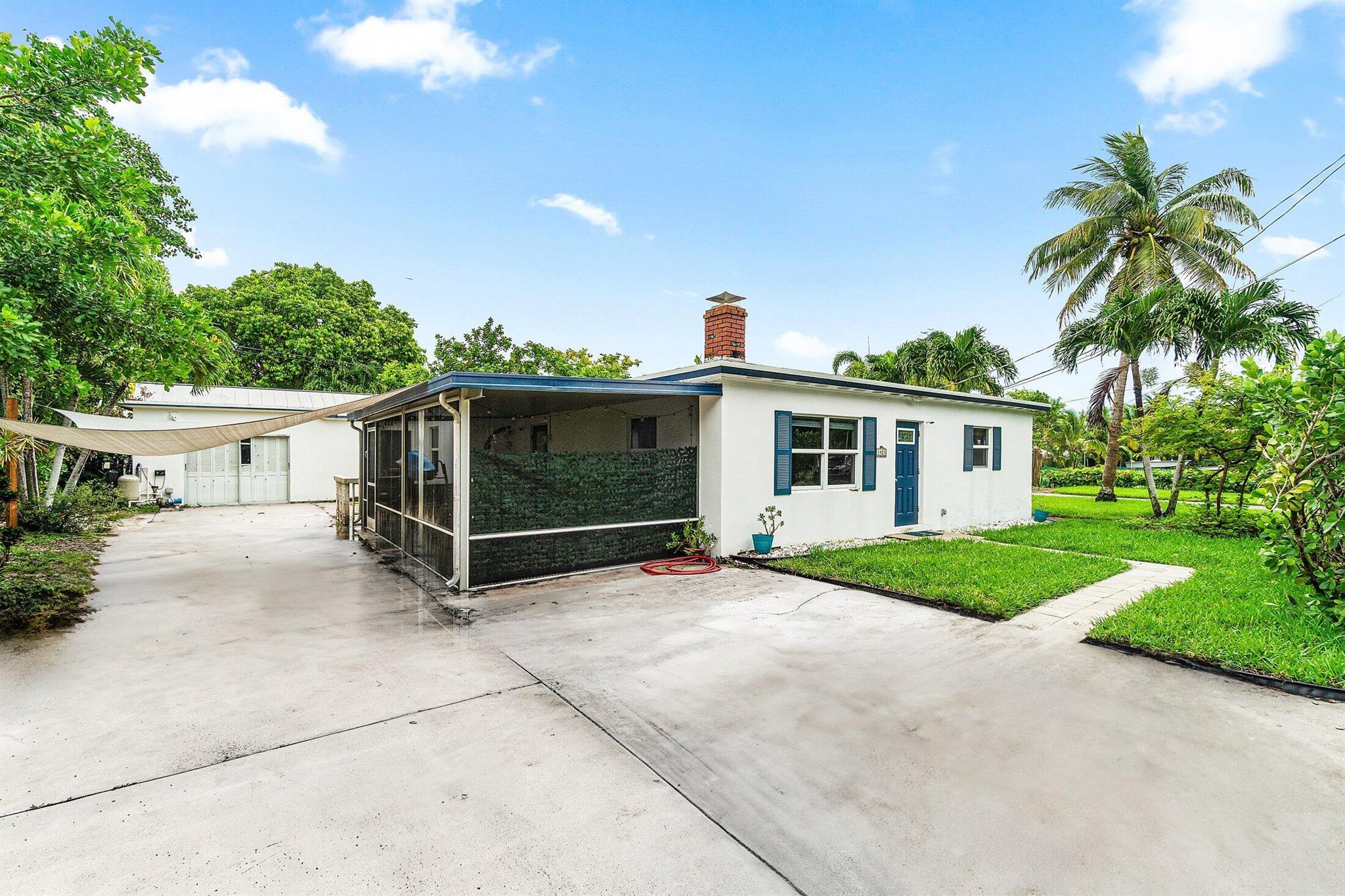 Great opportunity to own a beautifully remodeled 3-bedroom, 2-bath home in a very desirable location. Move-in-ready property features, Freshly painted,  updated finishes, an open-concept layout, and modern comforts throughout, water filtration system, impact windows, screened porch, uv filter, working fireplace and, roof installed in 2022. Sitting pretty with an adjacent lot included, all zoned for multi-family, this home offers space to expand, create an income-producing unit, or simply enjoy extra outdoor living.Whether you're looking for your forever home, vacation, investment  or a smart addition to your portfolio, this one has the potential to do it all