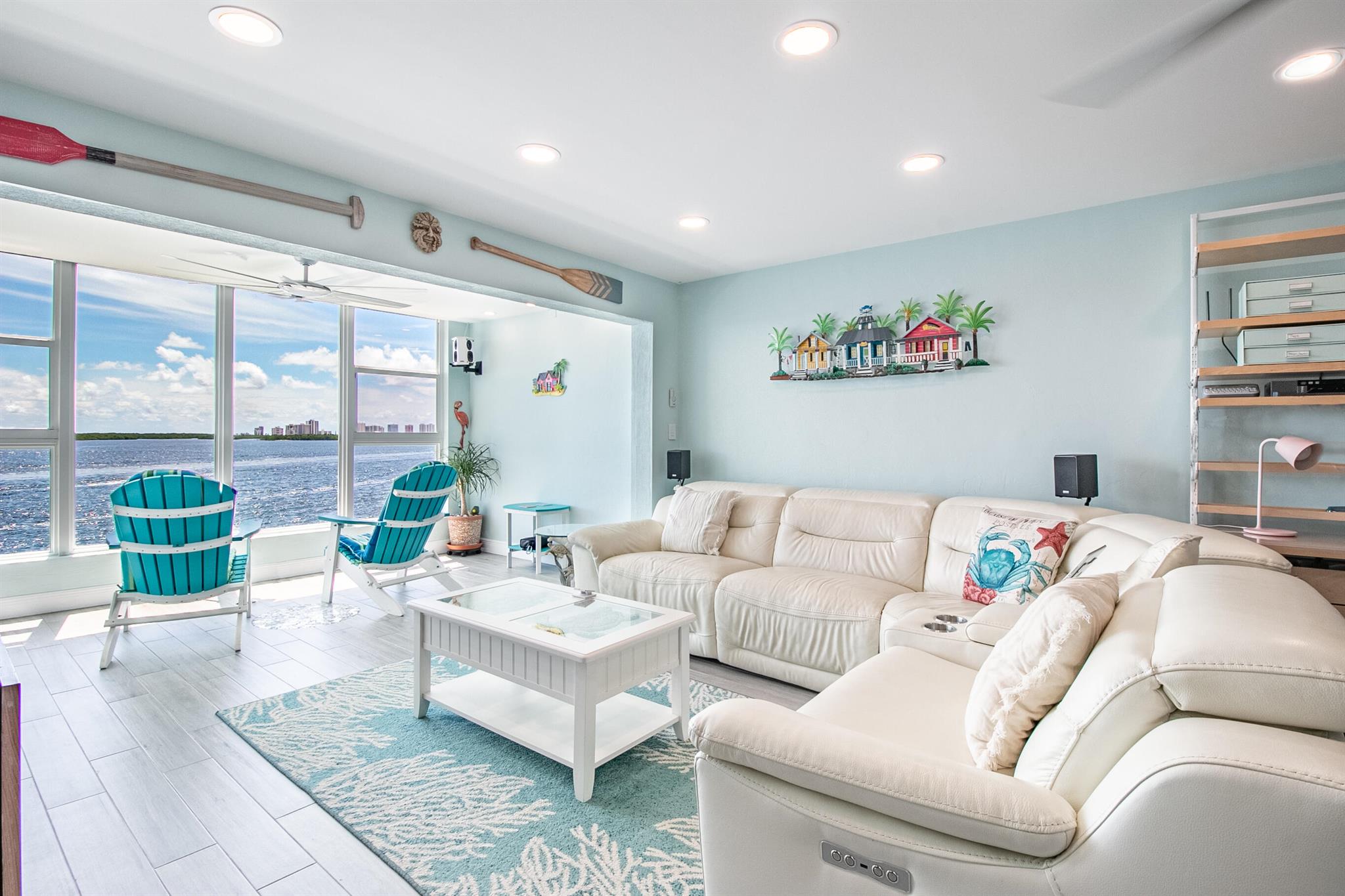 Beautifully updated unit with fabulous wide open intracoastal views. Age restricted community. New wood look tile flooring in living areas and high quality wood plank flooring in bedrooms, updated kitchen and bathrooms. Walk-in closet with slide out shelving. High hat lighting and top quality ceiling fans. Smart lights and thermostat can be programmed, voice activated or used manually. Reverse osmosis water treatment system. Hurricane resistant windows and front door. In addition to hurricane resistant glass, windows have added protection of electric roll down hurricane shutters. Shutters are so easy to use they can also be utilized for window shades. A/C unit is 2019. Condo association passed SIRS and milestone inspection. Association dues include water, use of 2 community docks, swimmin building maintenance, laundry facilitites, building insurance, and grounds maintenance. This condo is located in the highly desirable Village of North Palm Beach. Many options are available for outdoor recreation, entertainment, dining, cultural events and more. Live like you are on vacation every day!