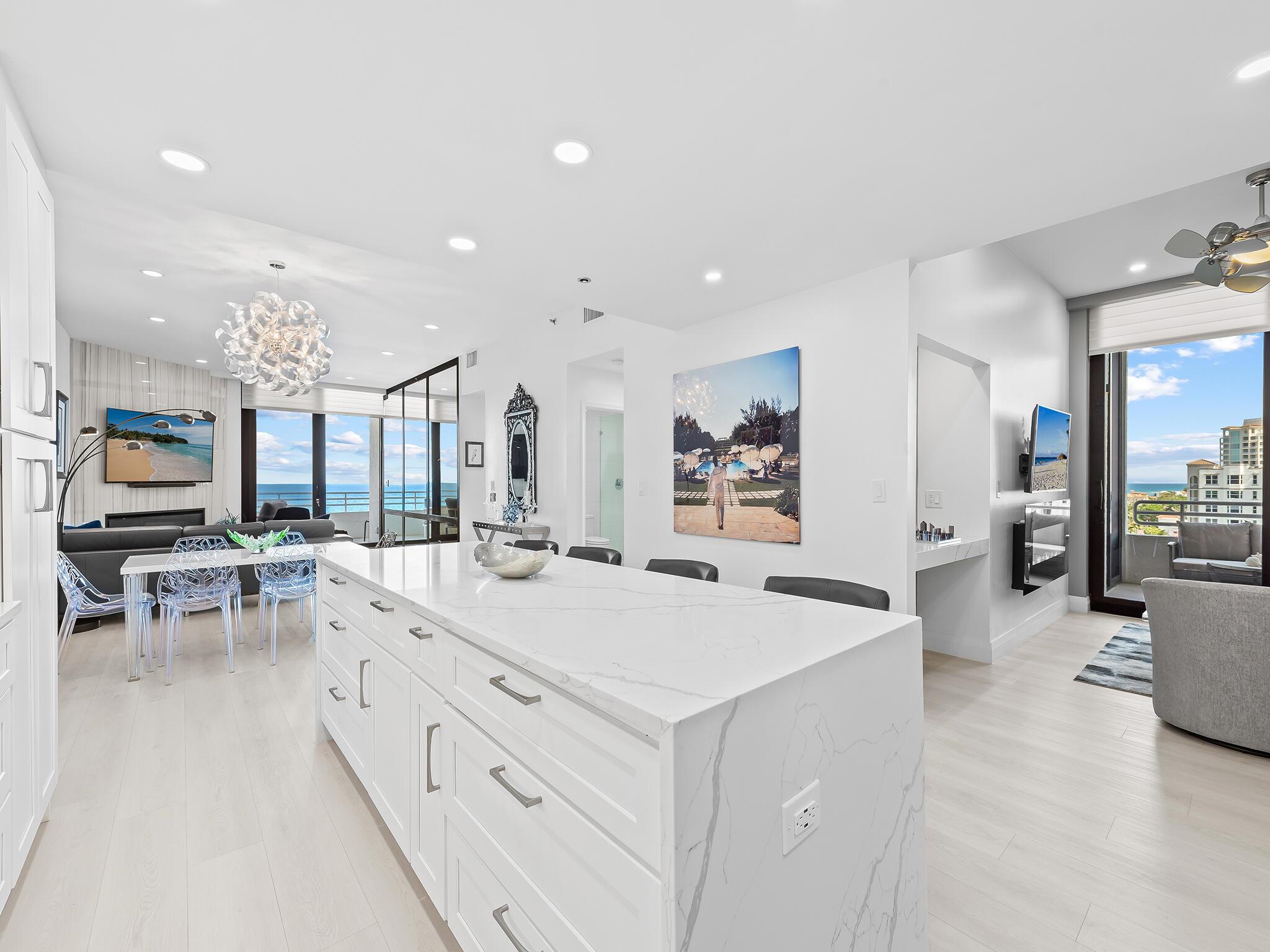 Unnobstructed Ocean Views from this totally redesigned turnkey Lower Penthouse residence! This beautiful South East corner 2-Bed, 2-Bath, features an open light-filled floor plan with high ceilings and water views from every room, open kitchen island, S/S appliances, all impact sliding doors and windows, walk in closets, expansive private covered balconies for an outdoor retreat showcasing fabulous ocean, city & sunrises views! Casuarina has a renovated lobby, newly installed hallways, private beach access with chairs waiting at the beach, heated large pool, tennis and pickleball, 24 hr manned security, social room with kitchen, fitness center, card room, shuffleboard, BBQ area, extra storage area with A/C covered, management office and garage parking with gated access