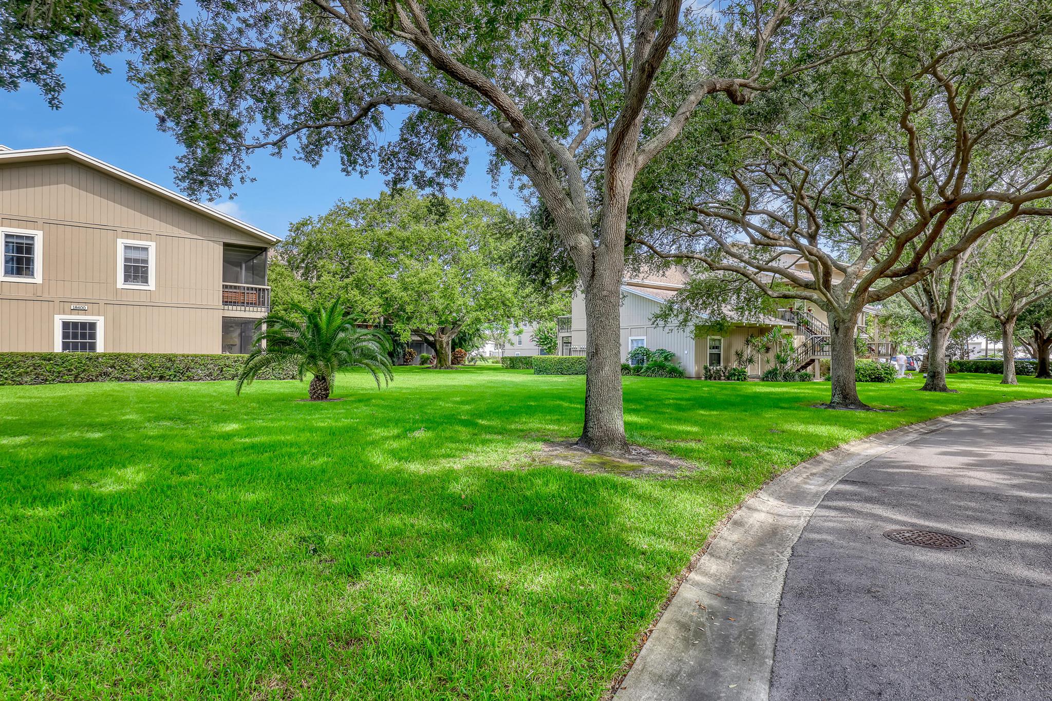Located in charming Tequesta. Riverbend Country Club is a gated, all ages welcome community. Quarterly golf dues of $715 include a private 18-hole Fazio golf course, tennis, pickle ball, swimming, water activities, clubhouse and more! Riverbend is located between the beautiful banks of the Loxahatchee River, and Jonathan Dickinson State Park. Riverbend offers resort style living at its finest. The pool and clubhouse sit along the quiet and scenic Loxahatchee River. Be in Jupiter or the heart of Tequesta in minutes to experience 5-star dining, aqua blue beaches, and fabulous shopping. Airport and highways are close by as well! This well cared for home offers an updated kitchen with newer appliances and engineered hardwood flooring throughout that is open to a light and bright living and dining area, the main balcony overlooks a natural serene setting. There is a beautiful newly updated powder room on the main floor. Upstairs you will find a spacious updated master suite, with private balcony, and a second bedroom and updated bath, with nobody living above you! New roof 2024! Be sure not to miss this special property.