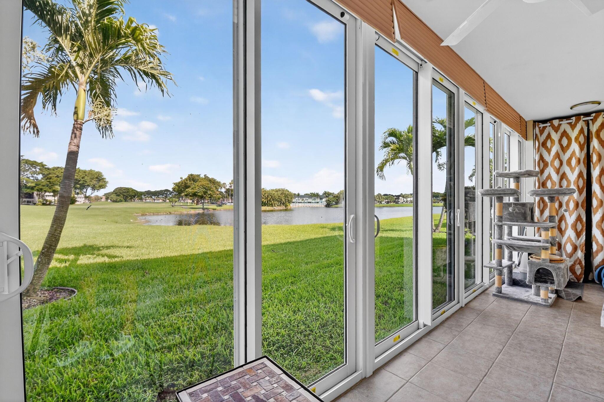 LOCATION!  LOCATION!  LOCATION!  You cannot beat this lake and golf view from your livingroom and patio!  Floor to ceiling glass doors! Kings Point luxury model - our largest in the communiy!  This condo is n the coveted Isle of Capri section.  Building is concrete block construction and very well maintained.  First floor, tile floors throughout, impeccably maintained. Kings Point offers activities year round!  clubs, movies, seasonal live shows, 2 restuarants, free community transportation and more!  2 golf courses, 3 clubhouses, and multiple pools.  COME SEE THIS ONE!