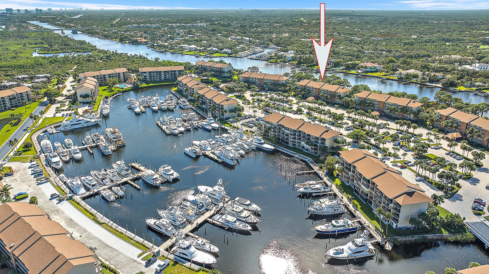 Soak in sweeping Intracoastal views by day and vibrant sunsets by night--right from your private balcony! This beautifully renovated waterfront condo offers a prime opportunity to live the Jupiter lifestyle. Enjoy a fully updated kitchen featuring quartz countertops, custom cabinetry, and new appliances. Bathrooms have been tastefully remodeled, and you'll love the added touches throughout--crown molding, built-in office space, and a brand-new washer and dryer.Just steps from your front door, relax at the pool while watching yachts glide into the marina. Marina at the Bluffs offers resort-style living with pickleball, tennis, four pools with clubhouses, bocce, BBQ areas, and a full-service marina with dock master. Take a 10-minute stroll to Jupiter's dog-friendly beach, or walk to Publix, dining, and shops in under five minutes. You're also just minutes from Juno Beach Pier, Ocean Cay Park, and all the best of the Jupiter area.

The building has completed its Milestone Study&#x14;more details available at the Marina Bluffs website.

Direct Intracoastal units like this are rare&#x14;don't miss your chance to own a slice of paradise.