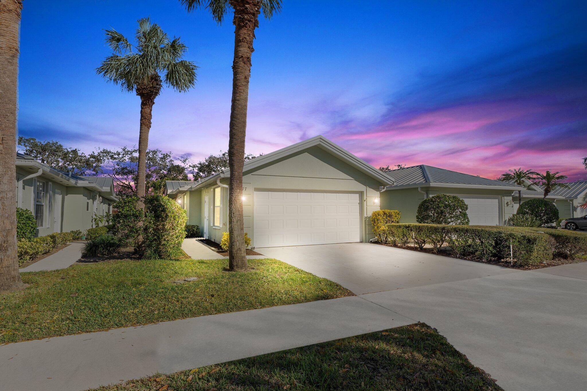 If you are looking for a low maintenance property in a prime Martin County location, this solid concrete villa is a great option! The DiVosta Capri is a timeless 1 story villa that has a reputation for its quality construction. The property offers 2 spacious suite style bedrooms, a large open kitchen & family room, extended sitting room & large screened lanai. The back yard is fully fenced & private. The roof was replaced in 2016, AC 2018, new flooring installed in 2023. The HOA fee includes lawn maintenance & landscaping, internet, cable, building insurance & a 24 hr. manned gate & onsite property management. There are new pickleball & tennis courts, heated pool, toddler pool, playground & bocce ball courts. Fantastic location with quick access to the turnpike & I-95.