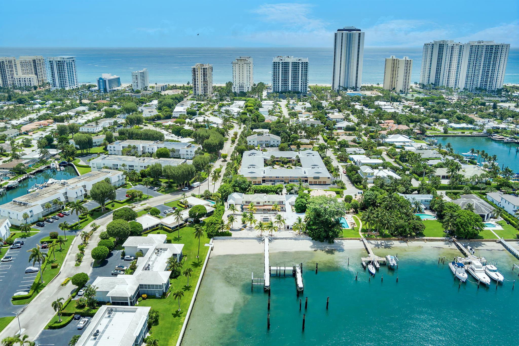 Unmatched Waterfront Estate Opportunity on Singer Island. Welcome to the largest waterfront lot on Singer Island north of the bridge--a truly rare offering boasting 159 feet of direct Intracoastal frontage and breathtaking panoramic wide-water views. Set on 3/4 of an acre, this private estate epitomizes the pinnacle of South Florida coastal living, just minutes from the Palm Beach Inlet and within walking distance to pristine beaches. Tailored for serious boating enthusiasts, the property features a new seawall and dock, four oversized boat slips--including accommodations for large yachts--24,000 lb Hurricane Boat Lift-- 480V 3 Phase power and water. The expansive grounds include a private sandy beach and a sprawling yard perfect for entertaining. A to be completed resort-style pool with a 4ft deep lazy river, promising the ultimate in outdoor leisure. Additional highlights include a separate renovated 3-car and a new 2-car garage&#x14;ideal for a car collection, storage, or workshop space&#x14;and a fully renovated detached 2-bedroom, 2-bath guest house complete with full kitchen and living area, offering exceptional accommodations for guests or extended family. Whether you choose to renovate the existing structures or build your dream waterfront mansion, this property presents a rare, one-of-a-kind canvas for luxury living. Bring all your water toys and enjoy immediate access to world-class boating, fishing, and beaches. Don't miss this extraordinary opportunity to own one of the most coveted waterfront estates in Palm Beach County.