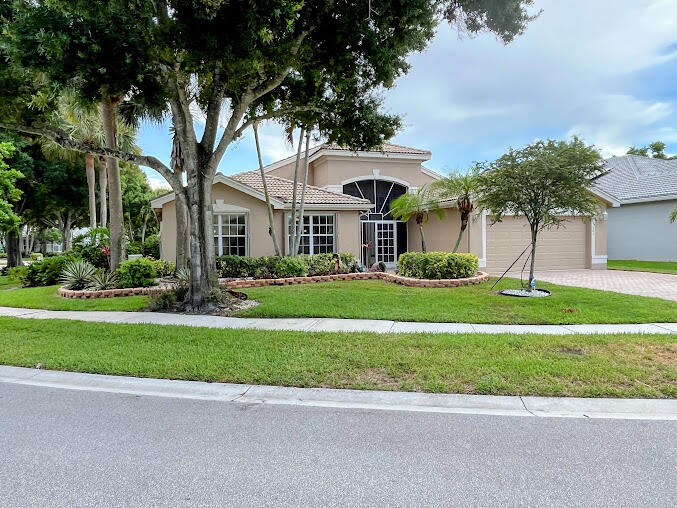 Spaceous 3-2 GRANADA model home awaits you in this exciting, GATED 55+ community.Bright arched ceiliengs with ceiling fans. Primary bedroom with tray ceiling. Ceramic FLOOR TILE throughout. Generac 22KW GENERATOR w/ propane tank. Eched transome windows,  Clubhouse renovation COMPLETED ! ! ! PICKLEBALL COURTS UPGRADED TO hard surface ! ! ! Amenities include Cafe, Lagoon and Lap Pools, Pickleball, Tennis,Golf, Bike club, Fitness Center, Water activities, Yoga, Zumba, Visual Arts, Theater Productions and so much more!  Dining room chandilier not included.Make Paradise your full-time residence,this home awaits the next buyer to live life to the fullest. Information is deemed to be reliable, but isnot guarantee