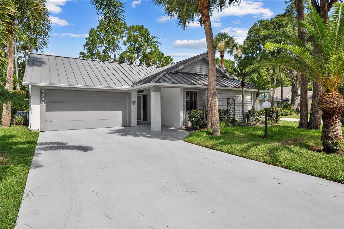 Incredible opportunity in one of the most desirable neighborhoods in Jupiter! This lovely 3-bed, 2-bath pool home offers the ideal blend of comfort, style, and Florida living. CBS with metal roof (2022), this home will provide peace of mind for years to come. A/C replaced in 2018, adds to the home's value and efficiency. Nestled on a quiet street the property offers both privacy and a sense of community. Step inside to find an open, spacious floor plan that's ideal for everyday living and entertaining. The vaulted ceiling entry enhances the airy feel, while the living room opens seamlessly connecting your indoor space to the expanded family room, screen enclosed pool and spa area--perfect for enjoying the Florida sunshine year-round. The kitchen is designed for casual gatherings with a cozy breakfast bar and a sitting area nearby. The primary bedroom is generously sized, featuring a lovely enclave sitting area overlooking the sparkling pool- ideal spot for morning coffee or a good book. You'll appreciate the two custom closets, double vanity sinks, and walk-in shower in the primary ensuite. The desirable split bedroom layout has two guest bedrooms situated at the front of the home for added privacy. Their shared bath with shower also serves as the guest bathroom. Outside, unwind by your private pool and spa or take advantage of the community's parklike settings sidewalks and benches overlooking the main lake, amenities including a community pool, tennis court, and clubhouse. Best of all, you're just minutes from excellent shopping, dining, and all the lifestyle perks that make Jupiter such a sought-after place to call home. This move-in-ready gem combines comfort, location, and value. Schedule your private showing today and experience Florida living at its best!