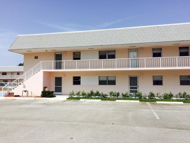 Lowest price 2BR/2Bth Condo in desirable Little Club Condo.  Second floor unit with covered, screened balcony.  Unlimited golf for homeowners.  Great opportunity to own a 2BR/2Bth condo for under $100,000.