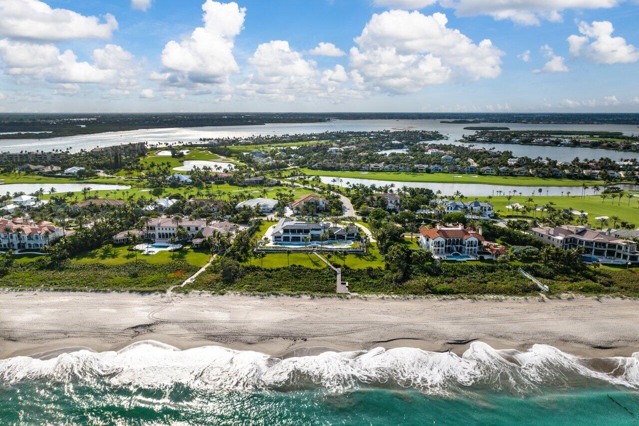 Tee Off in Paradise: This New Construction Oceanfront and Golf Dream Home Awaits your arrival within the gates of Sailfish Point in the quaint beach town of Stuart Florida. Golfers, take aim! This brand-new, coastal contemporary masterpiece redefines luxury Country Club living with golf, marina, tennis, pickleball, security and multiple restaurant amenities. Imagine waking to breathtaking ocean vistas, perfecting your swing in your private golf simulator, and then stepping onto the legendary Jack Nicklaus Signature course - all within your own backyard. With Nearly 300 feet of oceanfront unwind on your sprawling 2.12-acre estate, safely above flood zones, with endless ocean panoramas as your daily view. indulge in their passions. This home has two separate garages capable of housing 8 vehicles plus a wave runner trailer and 2 golf carts. Additionally the house features a separate entrance and parking for the Nanny or Property Managers office. Whether you're a boater, golfer, or tennis player, the community has it all, including a full-service marina just 59 miles from the Bahamas and minutes from the inlet, able to accommodate up to 125 foot vessel. The Sailfish Point Community is also located within minutes of a Private airport suitable for landing large private aircraft &#x13; Witham Field &#x13; Stuart Florida with US Customs on-site. Sailfish Point offers the ultimate Florida resort lifestyle with its oceanfront country club, fine &amp; casual dining, Har-Tru tennis courts, Jack Nicklaus "Signature" golf course, state-of-the-art fitness center &amp; spa, helipad, 1.5 miles of gorgeous beach, and 24/7 guarded &amp; patrolled security for peace of mind. Don't miss this once-in-a-lifetime chance to own a piece of luxury oceanfront living!