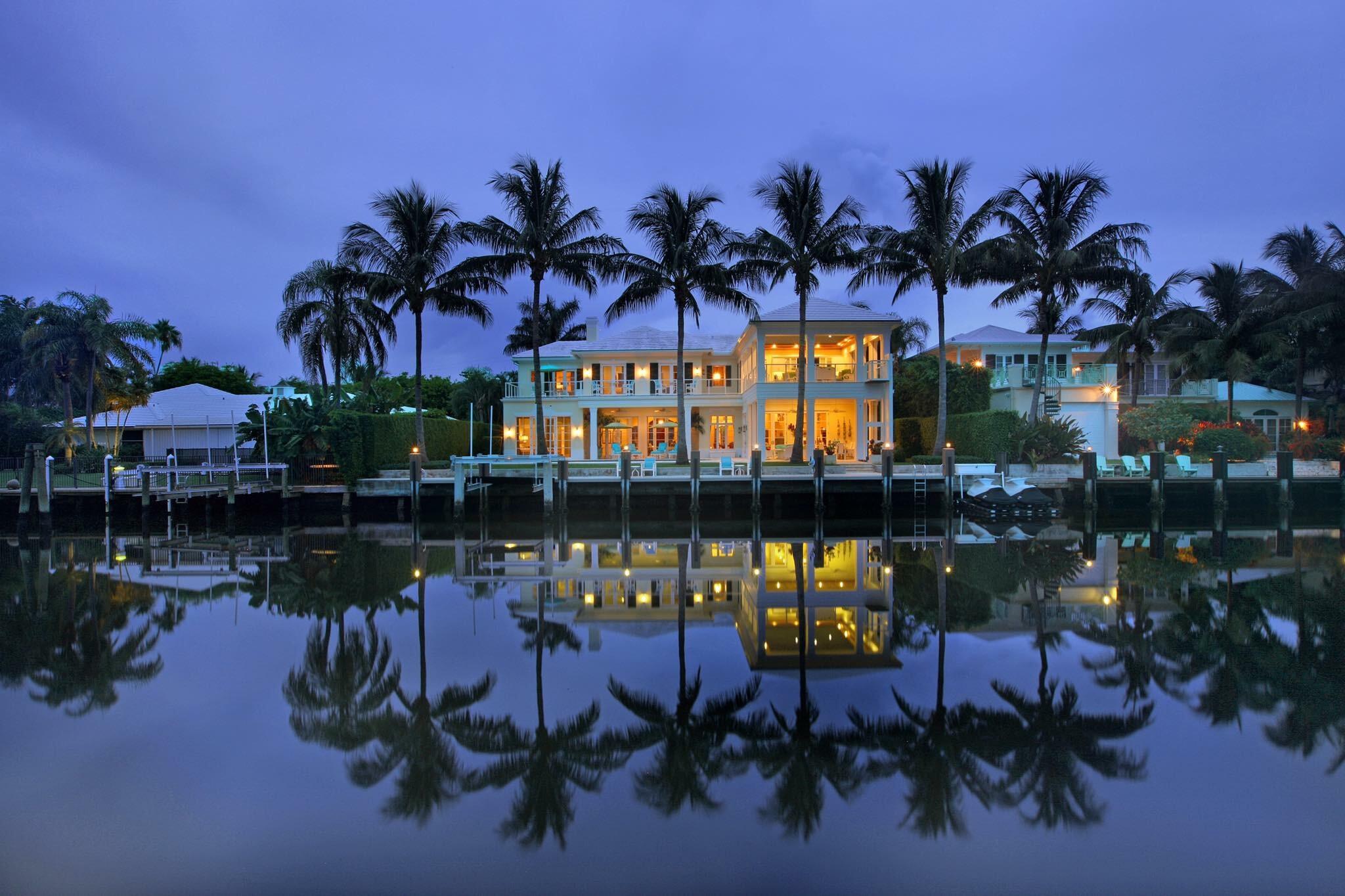 Own a piece of waterfront paradise in the highly sought-after North Beach neighborhood of Delray Beach. This waterfront home exudes an air of elegance and timelessness, with its impeccable architecture and decor that seamlessly blend classic and modern elements. As you enter the home, you are greeted by a spacious and open living area that features coffered ceilings, beautiful natural light, and elegant finishes throughout. The living area flows seamlessly into the new chef's kitchen, which is equipped with top-of-the-line appliances, custom cabinetry, and a large center island and bar perfect for entertaining guests. The home's expansive layout includes four generously sized guest bedrooms, each with their own ensuite bathroom and ample closet space plus a spacious bonus room. The primary bedroom suite is a true oasis, featuring a spa-like bathroom with a soaking tub, dual vanities, and an oversize walk-in shower. 
One of the many highlights of this property is the unique upstairs patio, complete with a starry ceiling, entertainer's bar, an outdoor elevator and breathtaking views of the water. Whether you are looking to entertain guests or simply relax and unwind, this outdoor living space is the perfect place. 
Outside, the property features a private 80ft Trex dock, electric boat lift and twin jet ski dock providing easy access to the Intracoastal Waterway and the Atlantic Ocean. The backyard also boasts a beautiful pool and spa, surrounded by lush landscaping for ultimate privacy. 
This home offers the perfect combination of luxury and convenience. Enjoy easy access to the area's best restaurants, shops, and entertainment, all while living in your own private oasis on the water.