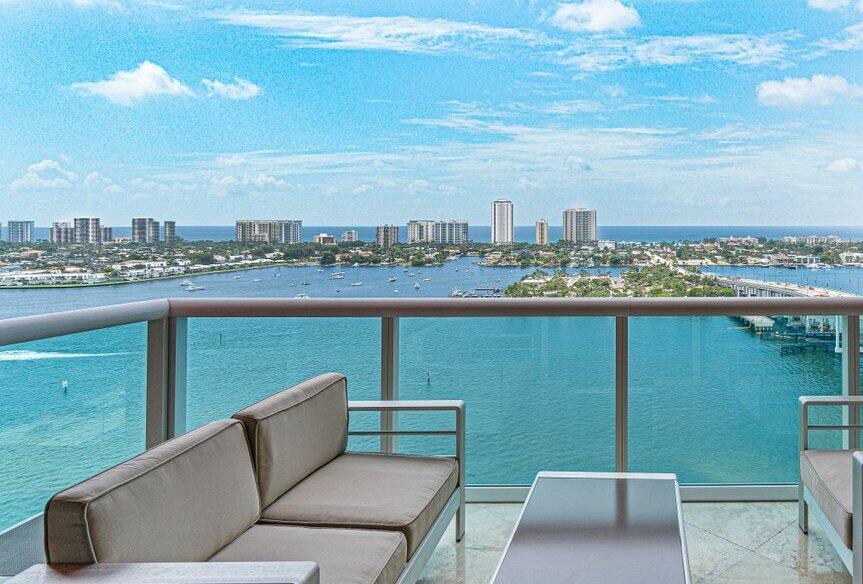 Bright, waterfront, fully furnished, 2 bedroom, 3 bathroom featuring a large terrace on the 21st floor with expanded eastern views of the Intracoastal to the ocean. The Marina Grande building is conveniently located near the beach, Peanut Island, and the world-class dive spot at Blue Heron Bridge. This building features newly updated amenities including a fully-equipped gym, tennis court, pickleball courts, spa with sauna, large heated pool with panoramic intracoastal views, sundeck with grill area, waterfront walking trail, 24-hr manned gatehouse, valet services, and covered parking. Enjoy the sunrise and your morning coffee on the balcony of this bright waterfront rental.
