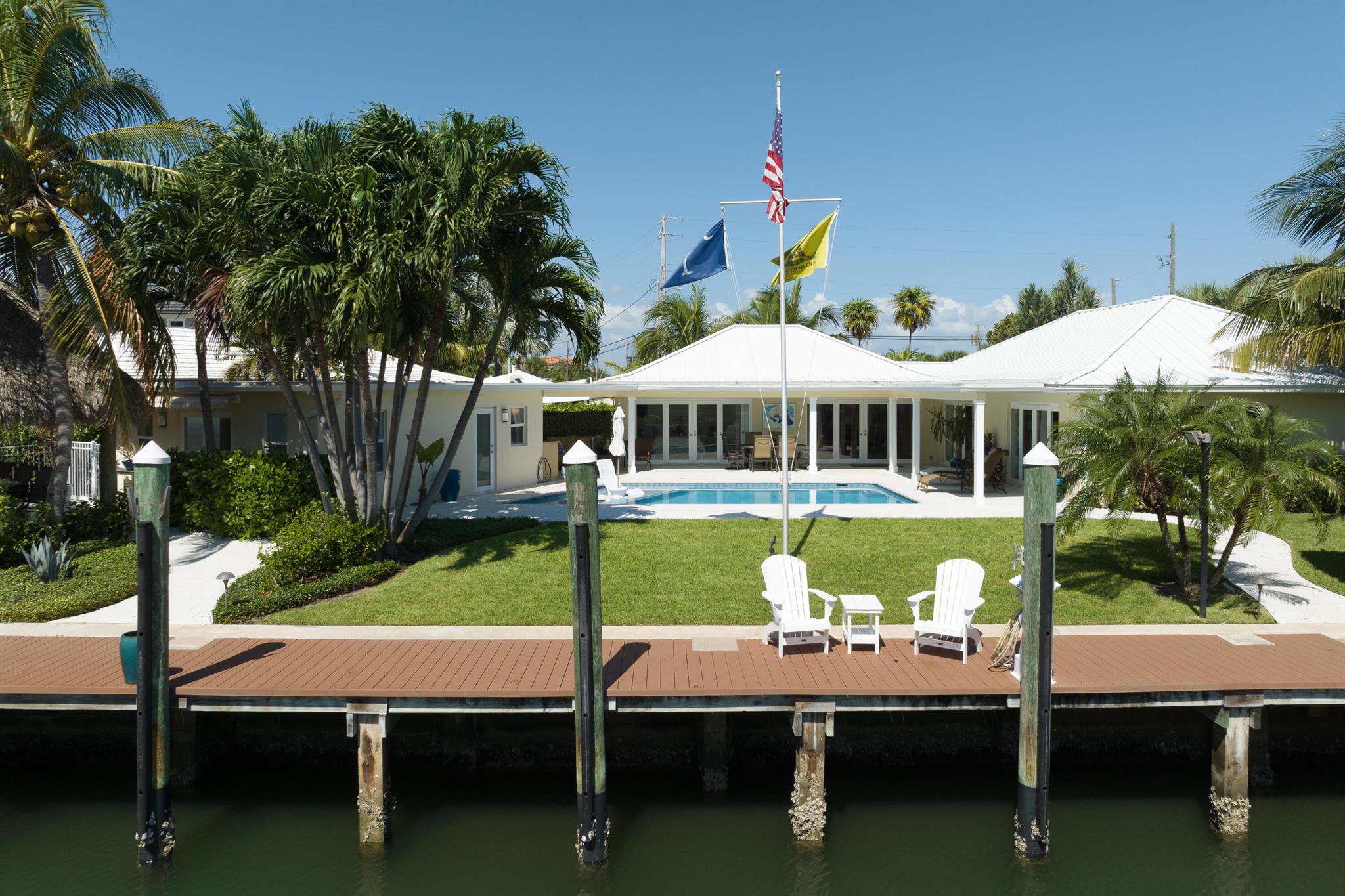 Completely High End Renovated Turnkey Waterfront Pool Home plus a fully renovated guest home with 135 Feet on the Water!  2 boat lifts including a 16,000 lb and 12,000 lb with room for a 60 foot yacht in between the 2 lifts.  Remove one of the boat lifts and there is plenty of room for an 80 foot yacht plus another large boat. Huge Custom Tiki hut with bar, grill and large tv. Call today for more details!