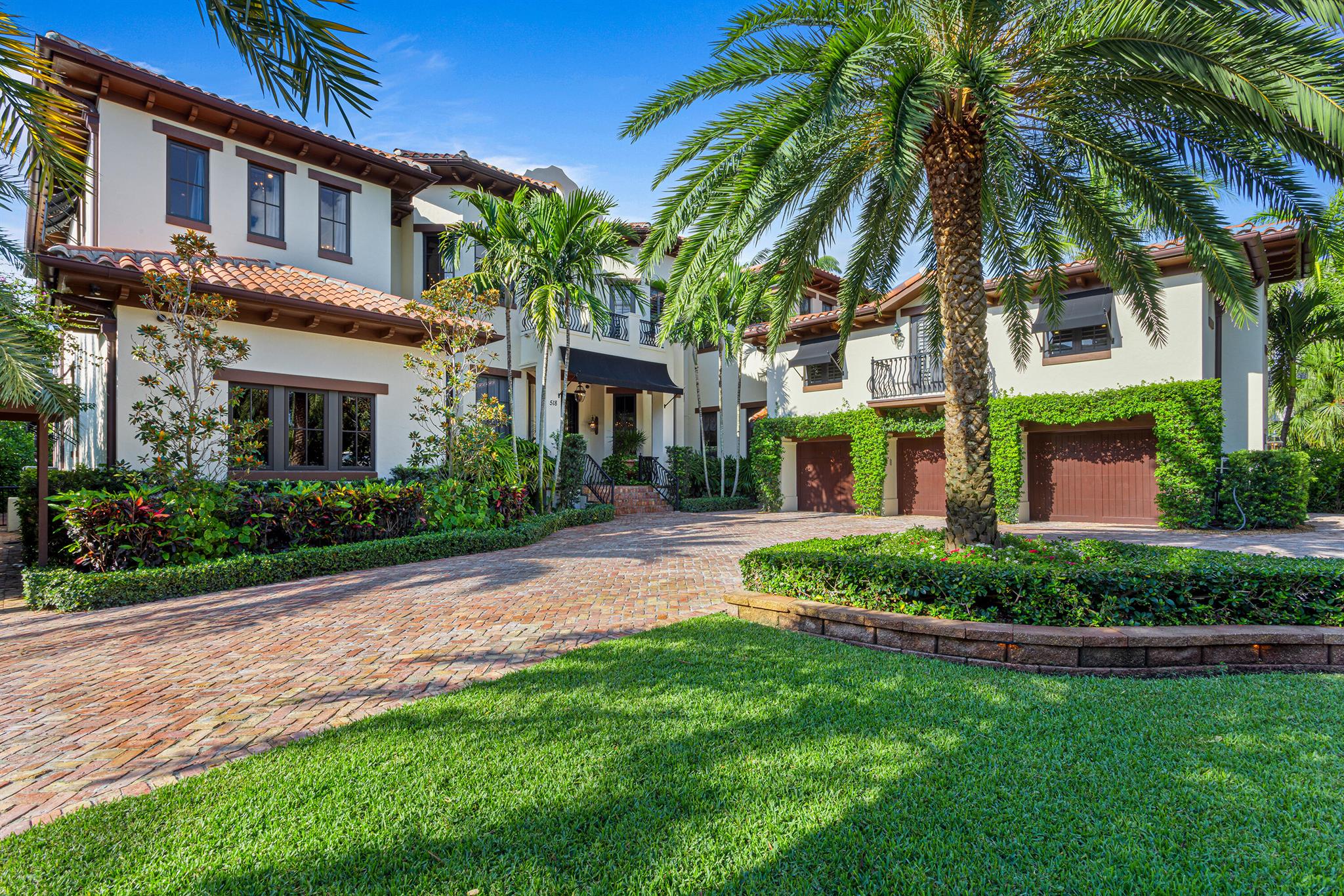 Renovated by GE Architecture and Lost Craft Builders, with no expense spared, this luxe European-style villa is in a private court neighborhood where homeowners share a tennis court and private beach access. Details are pecky-cypress touches, designer-embellished high ceilings, stunning brick-clad accent walls, and floors made with imported French roof tiles. Amenities include a home-theatre, wine cellar, and guesthouse. LOCATION: 

518 Harbor Court, Delray Beach, Florida: In prestigious Delray Ocean Estates North, a private court enclave, across from Delray Beach's award-winning beach, homeowners share a tennis court and private beach access.

PROPERTY: 
 
Enveloped in tropical landscaping shaded by mature Florida gumbo-limbo trees and palms, a Chicago-brick driveway leads to the courtyard entry and two-car garage. In the hedged backyard, the large loggia, with automatic hurricane-tested screens and a pecky-cypress ceiling, incorporates eating and dining areas along with the summer kitchen with a DCS Grill, sink and refrigerator. Just adjacent are the turf-carpeted putting green, conversation/dining firepit, and the large saltwater heated pool with a waterfall and spill-over spa. 

RESIDENCE: 

Presenting a European-Villa aesthetic, this elegant six-bedroom estate, with 9,744 +/ total square feet, was completely renovated by Gary Eliopoulos, of GE Architecture and Lost Craft Builders. Details throughout include pecky-cypress finishes, designer-embellished high ceilings, stunning brick-clad accent walls, and floors made with imported French roof tiles. Handsome glass double doors with a wrought-iron grillwork open to the foyer that flows out to the great room. Features here include an impressive pecky-cypress beamed ceiling and sliding doors opening to the loggia overlooking the pool. Inviting entertaining, an intimate brick-clad, pecky-cypress-topped wine room is completed with a 475-bottle temperature/humidity-controlled wine cellar. The library is fitted with built-in cabinetry, beautiful wood trim work, and an ensuite bathroom with a sauna and steam shower. The cook-island kitchen, with a charming breakfast bay, is finished with custom wood Mouser Cabinetry, Taj Mahal quartz counters and two large sinks with Rohl faucets. Appliances include a refrigerator, freezer, two dishwashers, coffee center, convection/microwave and steam oven all by Miele. A SubZero refrigerator, Scotsman icemaker, and Speed Queen washer and dryer are in the adjoining pantry. The home theatre has eight reclining theatre chairs and plush leopard-printed velvet walls. The first-floor VIP suite includes a bedroom that opens to the pool loggia,  an ensuite bathroom, and a private sunroom. On the second floor are the primary suite, three decorator-curated guest-bedroom suites, and gym. Set apart in a wing of its own, the primary suite is an oasis of tranquility, featuring a morning bar, two custom-fitted walk-in closets, and a quartz-clad spa-inspired bathroom with custom cabinetry, dual sinks, Jacuzzi tub and steam shower. The primary bedroom includes a gym/office that open to a pool-view wraparound terrace, with a deck extension on the primary bedroom wing. Completing the layout are two laundry rooms, powder room and elevator, and over the attached two-car garage is a guesthouse/game room with a bathroom and efficiency kitchen. Amenities include a Lutron lighting system,  impact-glass windows and doors, full-house generator, barrel-tile roof, and natural gas accommodation. New this year are Lennox air conditioners,  reverse osmosis water system, and pool equipment.  


The information herein is deemed reliable and subject to errors, omissions or changes without notice.  The information has been derived from architectural plans or county records. Buyer should verify all measurements.

DISCLAIMER: Information published or otherwise provided by the listing company and its representatives including but not limited to prices, measurements, square footages, lot sizes, calculations, statistics, and videos are deemed reliable but are not guaranteed and are subject to errors, omissions or changes without notice. All such information should be independently verified by any prospective purchaser or seller. Parties should perform their own due diligence to verify such information prior to a sale or listing. Listing company expressly disclaims any warranty or representation regarding such information. Prices published are either list price, sold price, and/or last asking price. The listing company participates in the Multiple Listing Service and IDX. The properties published as listed and sold are not necessarily exclusive to listing company and may be listed or have sold with other members of the Multiple Listing Service. Transactions where listing company represented both buyers and sellers are calculated as two sales. The listing company's marketplace is all of the following: Vero Beach, Town of Orchid, Indian River Shores, Town of Palm Beach, West Palm Beach, Manalapan Beach, Point Manalapan, Hypoluxo Island, Ocean Ridge, Gulf Stream, Delray Beach, Highland Beach, Boca Raton, East Deerfield Beach, Hillsboro Beach, Hillsboro Shores, East Pompano Beach, Lighthouse Point, Sea Ranch Lakes and Fort Lauderdale. Cooperating brokers are advised that in the event of a Buyer default, no financial fee will be paid to a cooperating Broker on the Deposits retained by the Seller. No financial fees will be paid to any cooperating broker until title passes or upon actual commencement of a lease. Some affiliations may not be applicable to certain geographic areas. If your property is currently listed with another broker, please disregard any solicitation for services. Copyright 2022 by the listing company. All Rights Reserved.