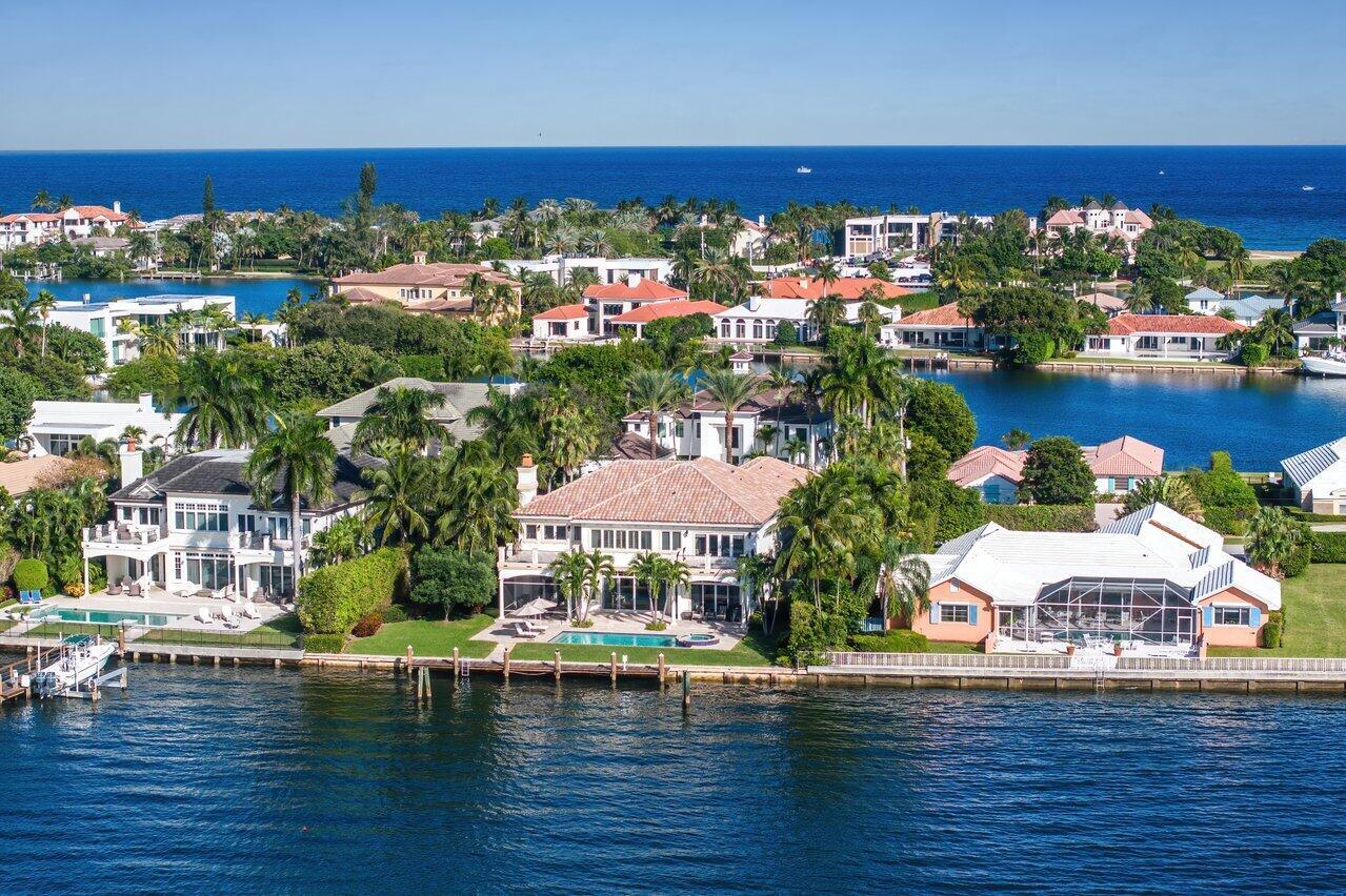 Exquisite 2-story Mediterranean waterfront home in secure, exclusive Manalapan Built by the famed luxury Hampton builder Farrell, this incredible 6,214 SF home has 5/BR and 6.5/BA and provides spectacular views and direct access to the deep, wide water Intracoastal Waterway. Enter the arched front door into the open floor plan with gorgeous marble and wood flooring and crown molding throughout. The 12ft height living room has an open bar area and wine room and there are custom French doors lead to the outdoor loggia, heated pool, spa, and dock. Many of the home's rooms feature unique tray ceilings, and all have custom crown molding finishes. The Christopher Peacock gourmet kitchen features commercial grade stainless steel appliances, a gas range, a spacious granite counter breakfast bar and center island prep area, a butler's pantry as well as a large in-kitchen dining area. The more private formal dining room with a Schonbek chandelier, is a few steps away and provides guests with lovely views of the lushly landscaped yard.

The large second floor master suite has both a lovely open sitting area with "his &amp; her" walk-in closets, and the master bath has a beautiful view of the intercoastal.

To access the second floor, use either of the two beautiful, stairways or take the elevator to the second master suite as well as the other family and guest bedrooms. The upper master suite features "his &amp; her" master baths, and a walkout deck that overlooks the pool and Intracoastal Waterway. The first floor also has a spacious library/den/office area that provides quiet privacy.

Additional amenities include electricity and water hook-up at the dock, no fixed bridges to access the Atlantic Ocean, and a 3-car attached garage with additional storage area, 
 
Manalapan home ownership and residency comes with a gratis membership to the La Coquille Club located in the EAU Hotel, a cherished part of the Manalapan experience. Members are granted access to the club's and hotel's many amenities, including pool, spa, private beach, tennis, golf, a business center, and the fitness and club room. Members are not charged initiation or fees and are billed only for the goods and services enjoyed while at the club with a 10% discount.

Additional advantages to living in Manalapan are the town's private police force, the nearby library, and the lowest property tax base in Palm Beach County. All of this is within a few minutes' drive of some from Palm Beach's best upscale shopping and dining.