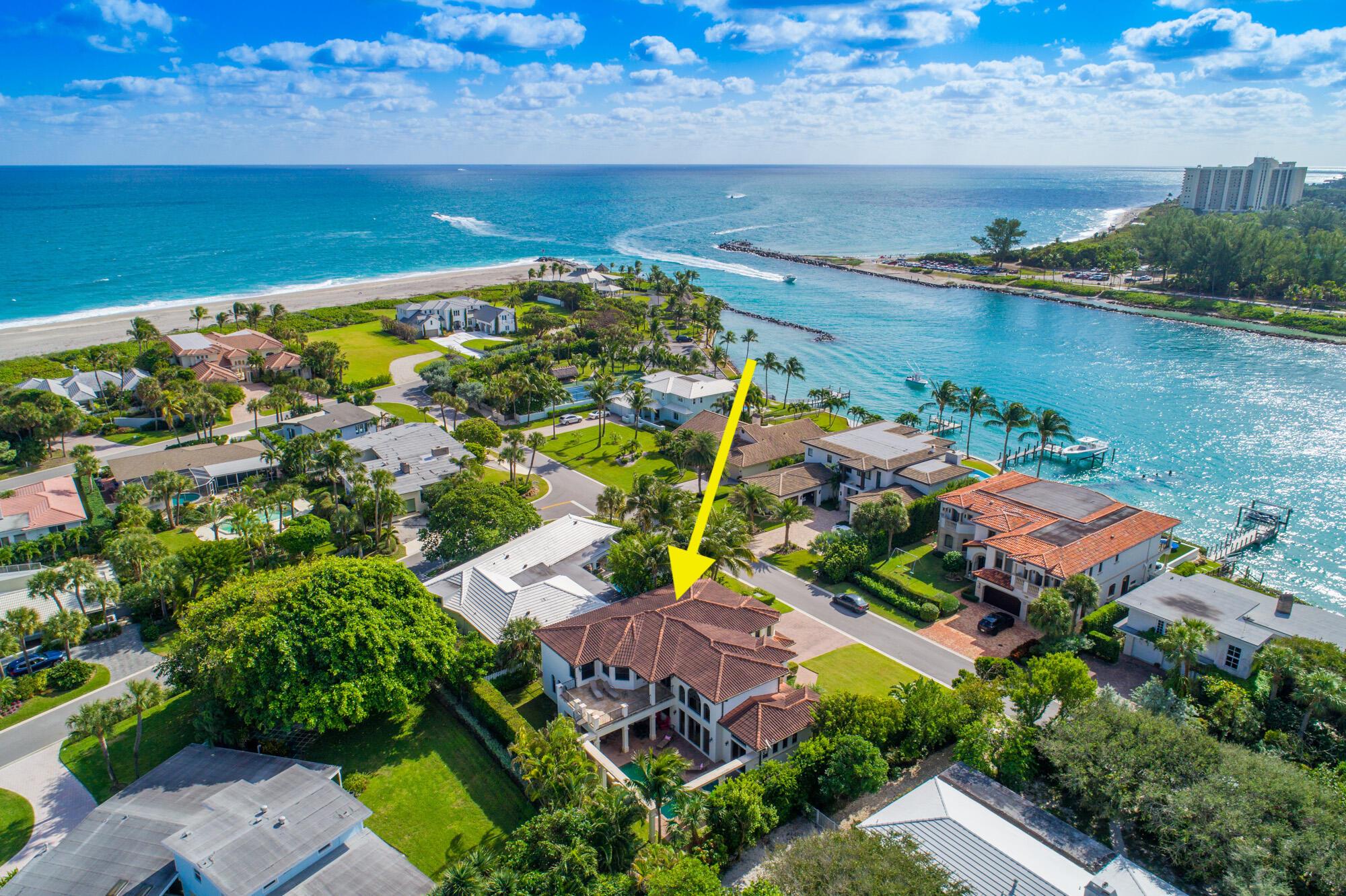 Location, location, location, this is one of the largest interior homes that can be built in the neighborhood. Highly sought after location and size. Welcome to this stunning Mediterranean-style coastal residence located in the highly-sought after Jupiter Inlet Colony. Enjoy being steps away from the private Beach Club, the Jupiter Inlet & the gorgeous turquoise ocean waters! Custom built in 2007, this magnificent 5 BD/5.5 BA concrete home with impact windows & doors was impeccably constructed with the finest design, craftsmanship, and functionality in mind. Enter this elegantly designed home and marvel at the abundance of natural light, arched windows, trey ceilings, marble and hardwood floors, custom woodwork, and much much more! The gourmet kitchen features top-of-the-line... ... and a large balcony boasting views of the inlet and Intracoastal, is a serene retreat within the home.  This prime location offers easy access to the beautiful beaches, marinas, and world-class golf courses that the Jupiter area is renowned for. This exclusive community with the area's only private beach club provides 24/7 security, ensuring your peace of mind. Don't miss the opportunity to make this exceptional property your own!
