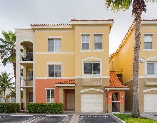 Welcome to this fabulous and updated 2BR/2BA condo in the prestigious Legacy Place located in the heart of Palm Beach Gardens. This condo features hardwood flooring, updated kitchen & bathrooms, and hurricane protection. The kitchen features white custom cabinetry, granite countertops, beautiful decorative backsplash, stainless steel appliances, large pantry, and tile flooring. The living & dining rooms are light & bright with an open floor plan plus gorgeous wood flooring, vaulted ceilings, fresh paint, and sliding glass doors that open to your covered balcony to enjoy with family and friends. The primary bedroom is very spacious, with wood flooring, fresh paint, and a large walk in closet with ample storage. The guest bedroom is light & bright, wood flooring, and fresh paint. Freshly Painted. Both Bathrooms have been Updated with Custom Cabinetry, New Vanities, Granite Countertops, Fixtures And Neutral Tile Flooring. Residence at Legacy Condos is a Wonderful place to live.  The Location is Prime and Convenient to Shopping, Beaches, Public Transportation, Restaurants and the West Palm Beach Airport. This Gated Community offers a Clubhouse, Beautiful Pool and Spa,  Tennis Courts, Fitness Center, and a Business Center, Make This Your Home Today!