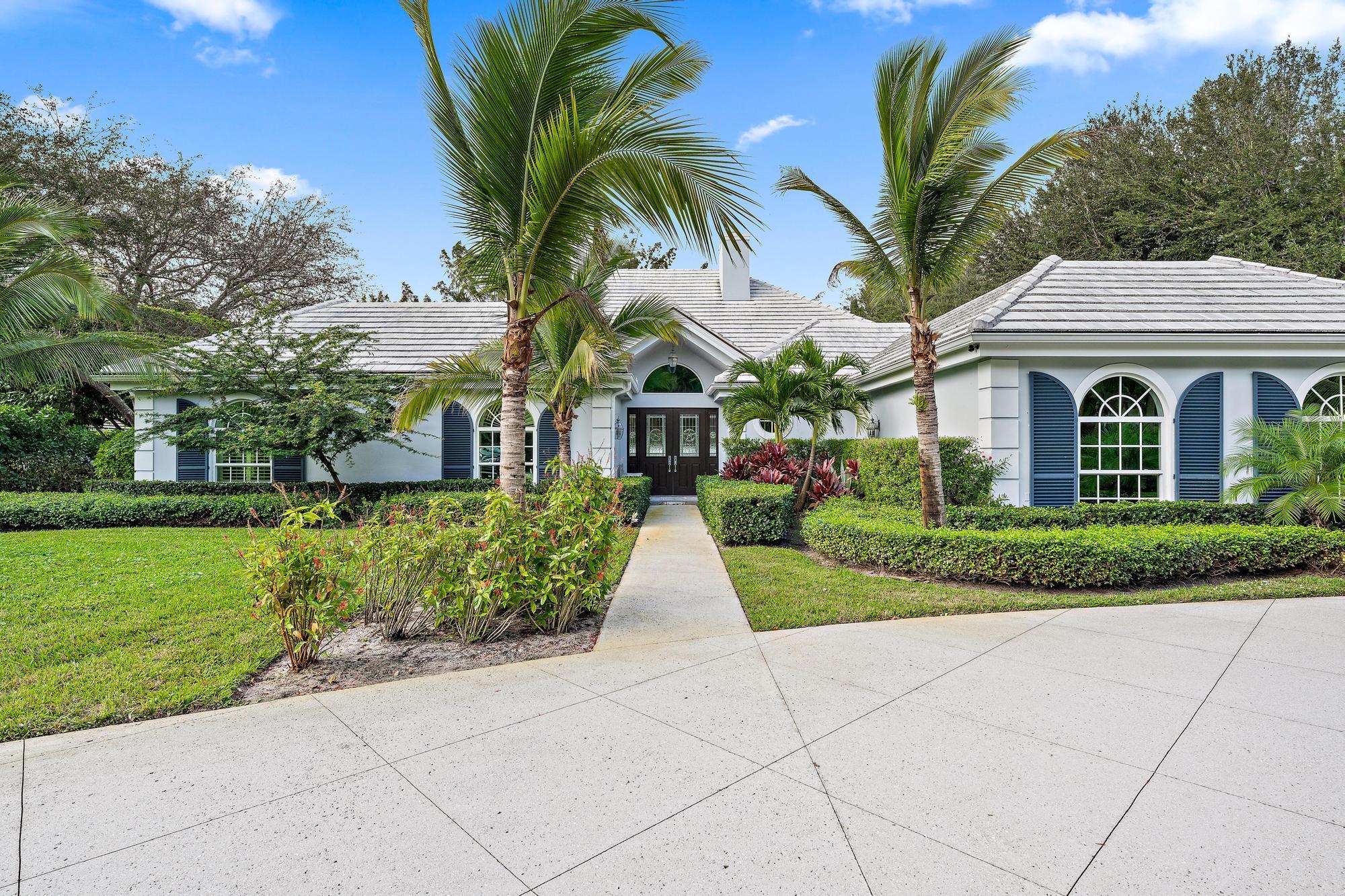 Welcome to this exceptional home within the coveted Seminole Landing community of North Palm Beach. This beautifully redone residence offers an unparalleled lifestyle with a perfect blend of elegance, comfort, and modern amenities like impact windows.This spacious home boasts 4 bds, 3 bths, 1 half bth, and an office/den, providing ample space for both relaxation and productivity. The interior has been thoughtfully updated, featuring contemporary finishes and high-end details throughout. Situated on over an acre of property, the exterior of the home features a refreshing pool, a covered patio for al fresco dining, and a summer kitchen, perfect for entertaining and enjoying the Florida sunshine. Seminole Landing is a small gated community with private beach access and tennis course