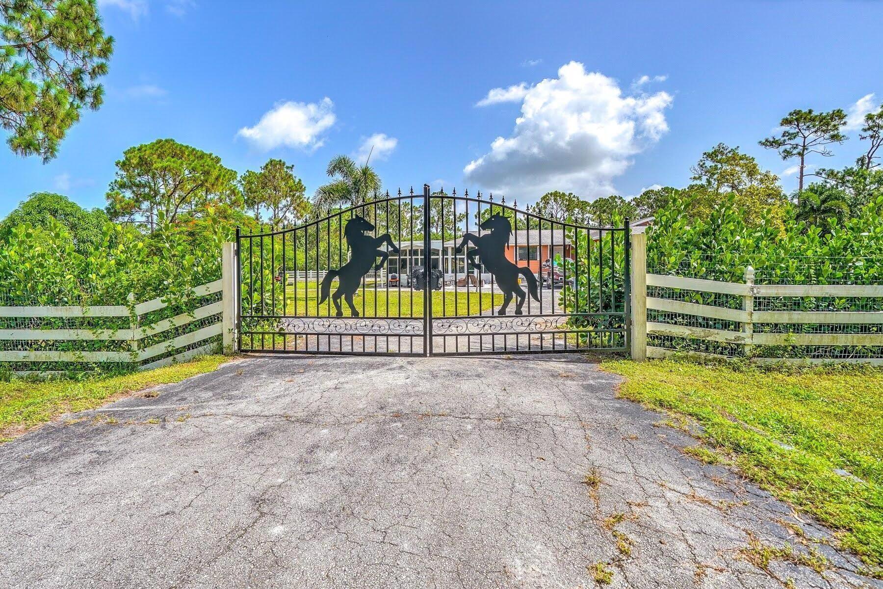 ***PRICE REDUCED FOR FAST SALE*** 4-Bed, 2-Bath Home on Over 1 Acre in Loxahatchee This stunning 4-bed, 2-bath single-family home is a true equestrian paradise in the heart of Loxahatchee. Nestled on over 1 acre of picturesque land, this property offers a unique blend of modern luxury and timeless equestrian charm. Step inside to find a meticulously maintained andFULLY RENOVATED residence. Over 100,000 in renovations Every room showcases impeccable craftsmanship and high-end finishes, providing an inviting and comfortable atmosphere for you and your family. The heart of this home is the spacious social area, ideal for seamless entertaining and family gatherings. The gourmet kitchen boasts top-of-the-line appliances, ample counter space, and an expansive island, making it a chef's delight.