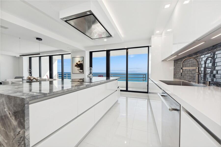 S-1503 is the height of oceanfront luxury. Newly renovated in 2022, this 2 bedroom, 2.5 bath residence features every upgrade imaginable; the contemporary kitchen features state of the art appliances including a steam oven, convection cooktop island w/ extra storage, seating & waterfall edge. The living area includes a custom wet bar w/ a stunning wine display, perfect for entertaining. All of the bathrooms have fabulous finishes such as a heated towel bar. The Creston system conveniently controls lights, audio, video & thermostat in the unit. Raised ceilings, open spaces, sparkling porcelain, designer hardware & impact glass are just some of the amenities in this residence. This 15th floor unit offers panoramic ocean vistas to the east & fabulous city views of Boca Raton to the west. Information published or otherwise provided by the listing company and its representatives including but not limited to prices, measurements, square footages, lot sizes, calculations, statistics, and videos are deemed reliable but are not guaranteed and are subject to errors, omissions or changes without notice. All such information should be independently verified by any prospective purchaser or seller. Parties should perform their own due diligence to verify such information prior to a sale or listing. Listing company expressly disclaims any warranty or representation regarding such information.