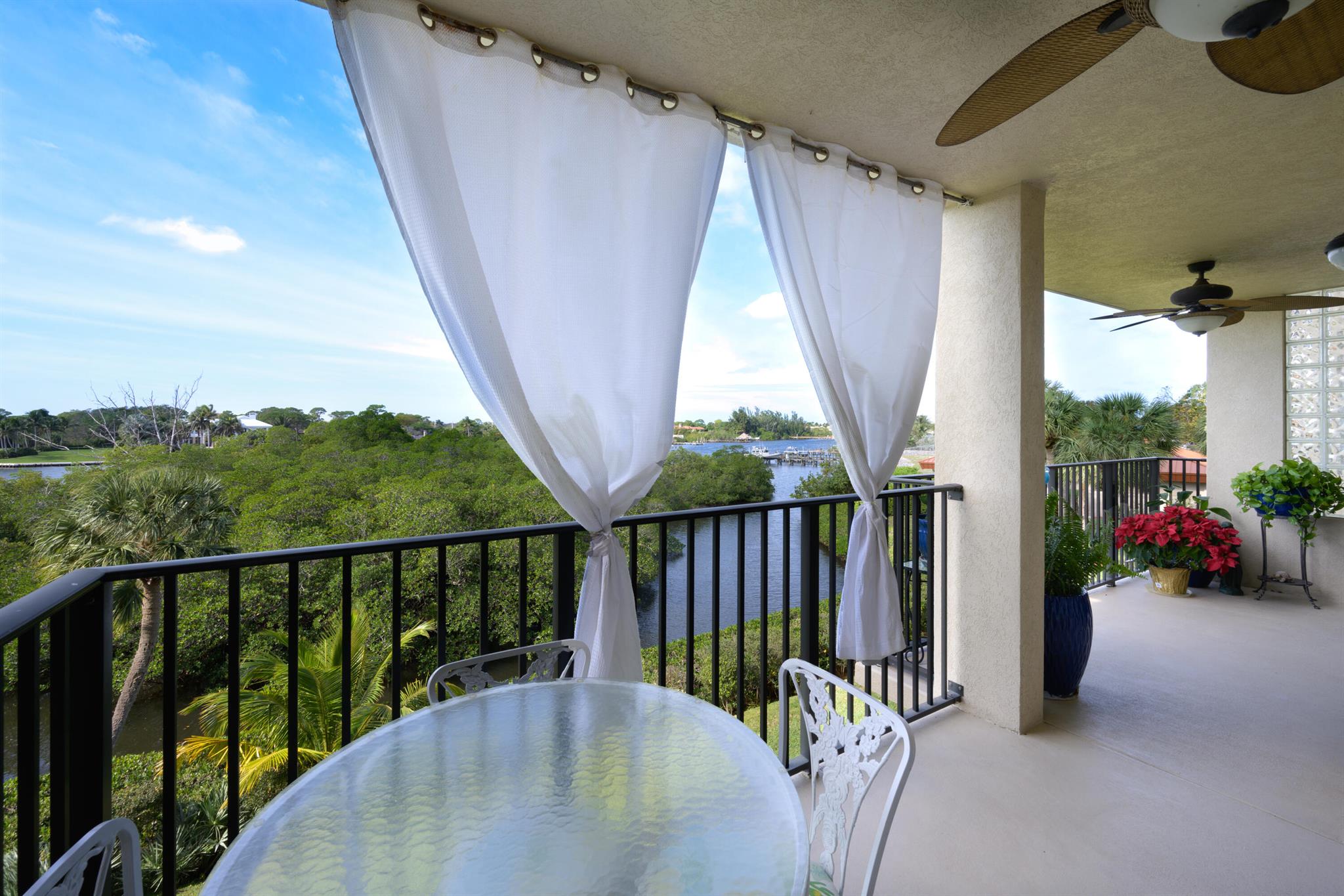 Enjoy sunset and sunrise views in this popular building. Both ''old Florida'' intracoastal views of mangroves, manatees,& herons, (plus boats sailing by) to the west,  and a deep water Marina to the east, this location is the best! The balcony is approx 9 years old; roof 3 yrs, a/c replaced in 2021. Custom kitchen with extended quartz counters with room for a bistro table at window. Impact windows and doors, porcelain floors in living areas. Lots of storage, and steps from elevator. Bike or walk to Publix, restaurants, and ocean. 4 pools to choose from. Feel like you are on vacation all year long.Ok to lease 2 x a year, after owning one year. Condo fee pd qtrly $1,918.52.Elevator assessment has been paid.Please note low homesteaded taxes.