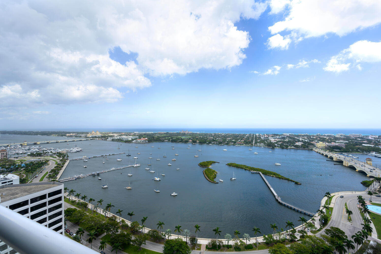 First time on the market in 24 years, one of only four Grand Penthouses at The Plaza. Classic elegance abounds, boasting 12 ft. ceilings with dome ceilings in the entry foyer leading into the grand living space with a fireplace at the focal point, complimenting the unparalleled panoramic views of the intracoastal, the island Palm Beach, and Atlantic Ocean. Chef's kitchen,  separate butler's pantry, staff powder room, laundry room. and impact windows. Private dining room, executive office with custom cabinetry with spectacular water views.  Situated on a prestigious  Flagler Drive, The Plaza's 5 Star Service is unrivaled including 24-hour valet, two pools, a tennis court, pickleball, an exercise room, and a club room.