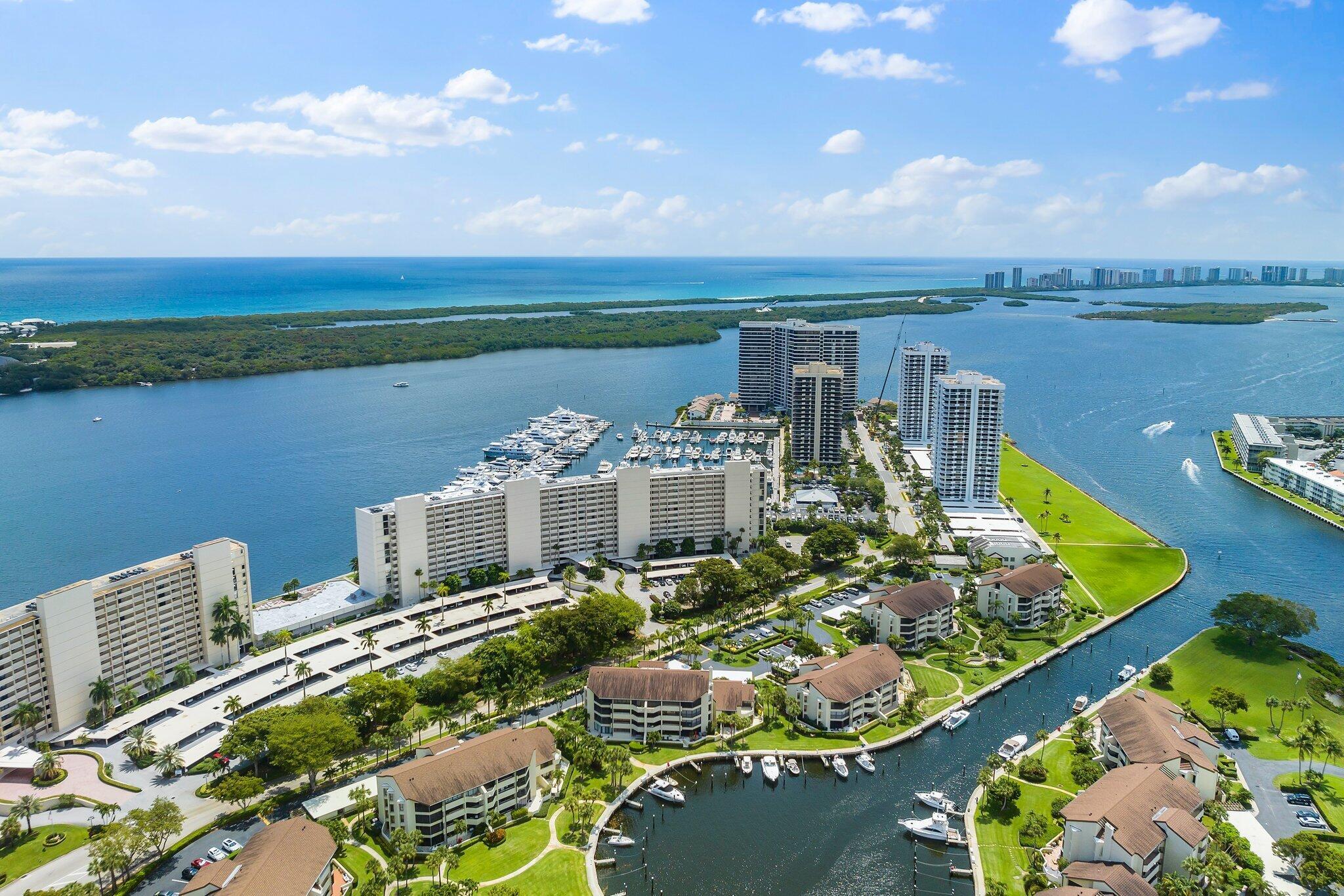 #ComeJoinUs at OLD PORT COVE a 60 acre resort style community! Experience breathtaking sunrises glistening on the water and yachts in the Marina from the balcony of your 3 bedroom, 2.5 bath meticulous 3rd floor condo offering over 1840 SF.  Grand entrance to the very spacious living room with Impact sliders to the balcony and open to the kitchen and formal dining room. Plenty of granite counter tops and cabinets fill this kitchen and is completed w/ stainless steel appliances, washer/dryer and is open to the 3rd br/den!  The Primary br has plantation shutters overlooking Marina, a luxurious new bathroom with updated plumbing and electric, quartz counter tops, huge closet spaces.  Pets are welcome, new A/C w/smart thermostat, home warranty and steps from elevator and parking plus-