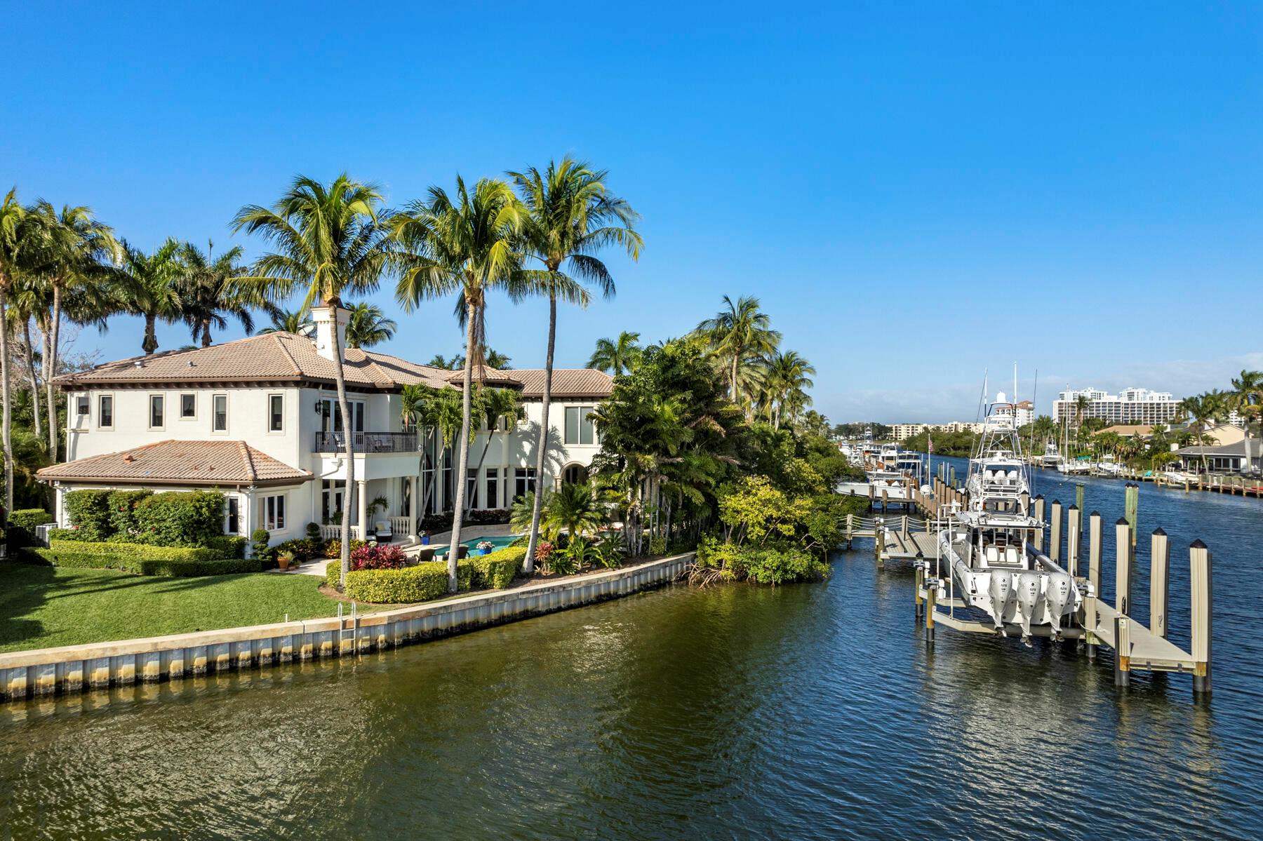 Indulge in the finest deep water dockage, capable of accommodating over a 130 foot yacht, along with tenders and toys. With a 30,000-pound lift and a 24,000-pound platform lift, enjoy effortless access to the Palm Beach Inlet, mere minutes away.  The property spans 175 feet of frontage, offering stunning southeastern views from the back of the home. Experience the epitome of luxury living in this exquisite estate, a true boater's paradise nestled in Harbour Isles. Boasting a complete renovation by Shapiro/Pertnoy Builders, this five-bedroom sanctuary leaves no detail untouched. Step inside to discover a fully updated gourmet kitchen adorned with gorgeous Labradorite stone, complemented by all Lead's Custom cabinetry and beautiful floor to ceiling built-in entertainment center. Unwind in the primary suite, featuring floor-to-ceiling windows that frame tranquil water views, and a spacious his-and-her bath, completely updated for your comfort.  Entertain in style with a bonus room over the garage, serving as the ultimate entertainment hub with a wet bar, large TV, and ample space for ping pong or pool table. No detail is overlooked, with a large air-conditioned tackle room providing convenient access to the dock area.  Additional features include an extended three-car garage for ample storage, a renovated pool with expansive decking, covered loggia, and summer kitchen - perfect for hosting unforgettable parties. Embrace modern convenience with a new Crestron system, newer impact windows and doors, and a whole house generator.

Harbour Isles is a gated waterfront community with 24 guard supervision. Easily accessible to I95 and the Turnpike without bridge interruption.

Don't miss the opportunity to make this waterfront estate your own, offering unparalleled luxury and sophistication.