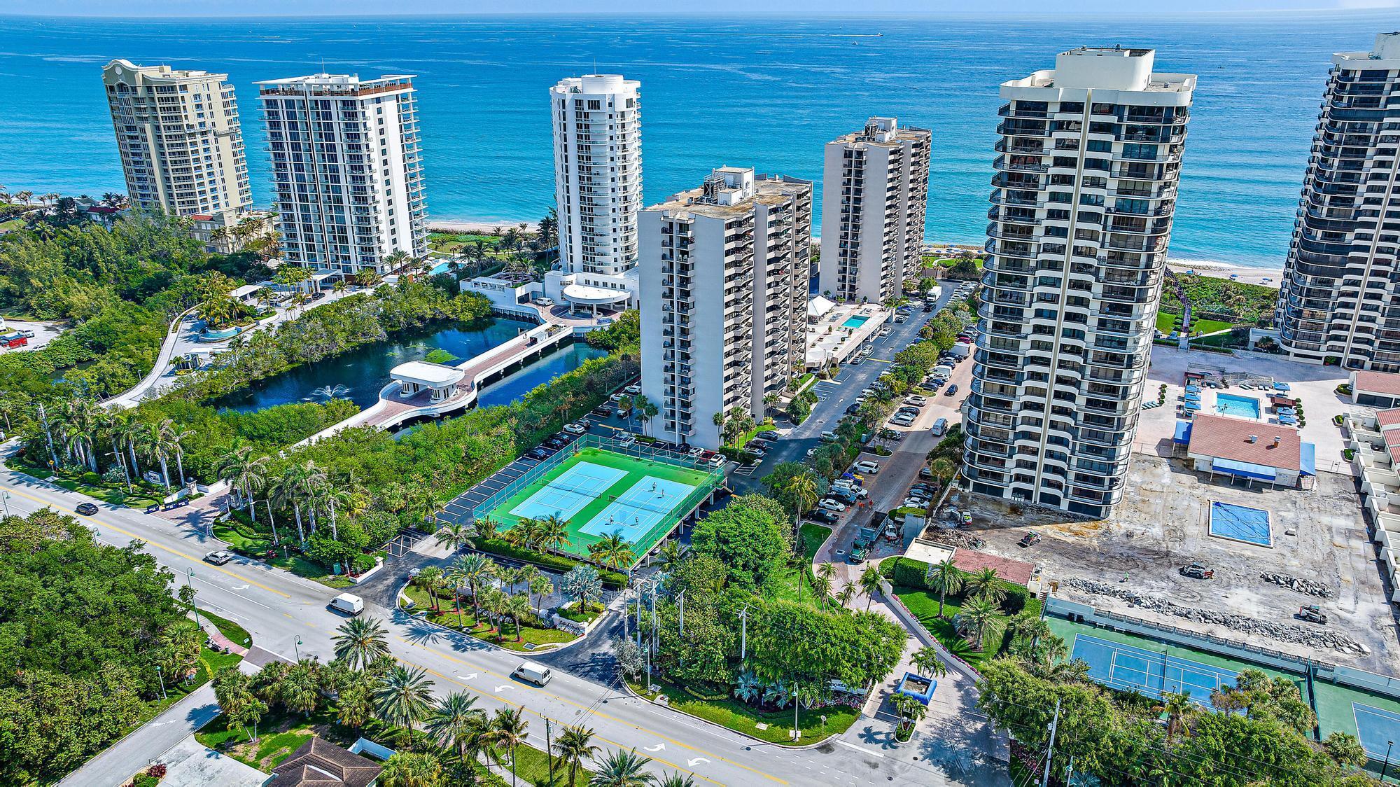 Located on Singer Island this 2 bedroom, 2 bathroom corner unit has two balconies, one to watch the sunrise over the Atlantic Ocean, and one to watch the sunset over the Intracoastal waterway and heart of Palm Beach County. This immaculate and spacious condominium is move in ready with fresh paint, custom kitchen cabinetry, granite countertops, full sized laundry room, tile flooring and impact windows and sliders throughout. The newly remodeled Cote D' Azur is an ocean front property that offers a large pool area, covered pavilion, 2 tennis courts, pickleball, gym, sauna, meeting rooms, newly renovated hallways and lobbies with secured gated entry & manager on site. Singer Island boasts some of Florida's finest beaches and offers a relaxed lifestyle with the option of an active nigh life