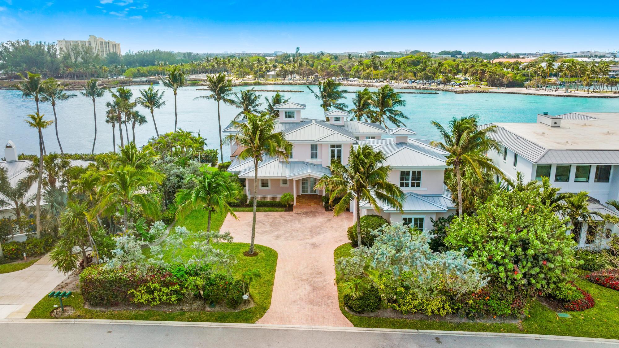 Spectacular WATERFRONT LOCATION AND VIEWS overlooking the Jupiter INLET at Jupiter Inlet Beach Colony on the south end of Jupiter Island. Endless possibilities with this traditional 2 story CBS home with 3 car garage with Bonus Room over the garage for an office or gym. Natural light with full IMPACT windows & doors and METAL ROOF. Spacious kitchen with island includes Sub Zero Fridge, Thermador double wall ovens, extra seating and pantry. 2nd floor Main Suite with water views, balcony, sitting area and walk through closet. Adjoining Bath includes walk in shower, double vanities and soaker tub. Additional on suite guest room upstairs overlooking the Loxahatchee River. First floor offers 2 bedrooms, 2 full baths and laundry room. JIC amenities include beach access and police department.