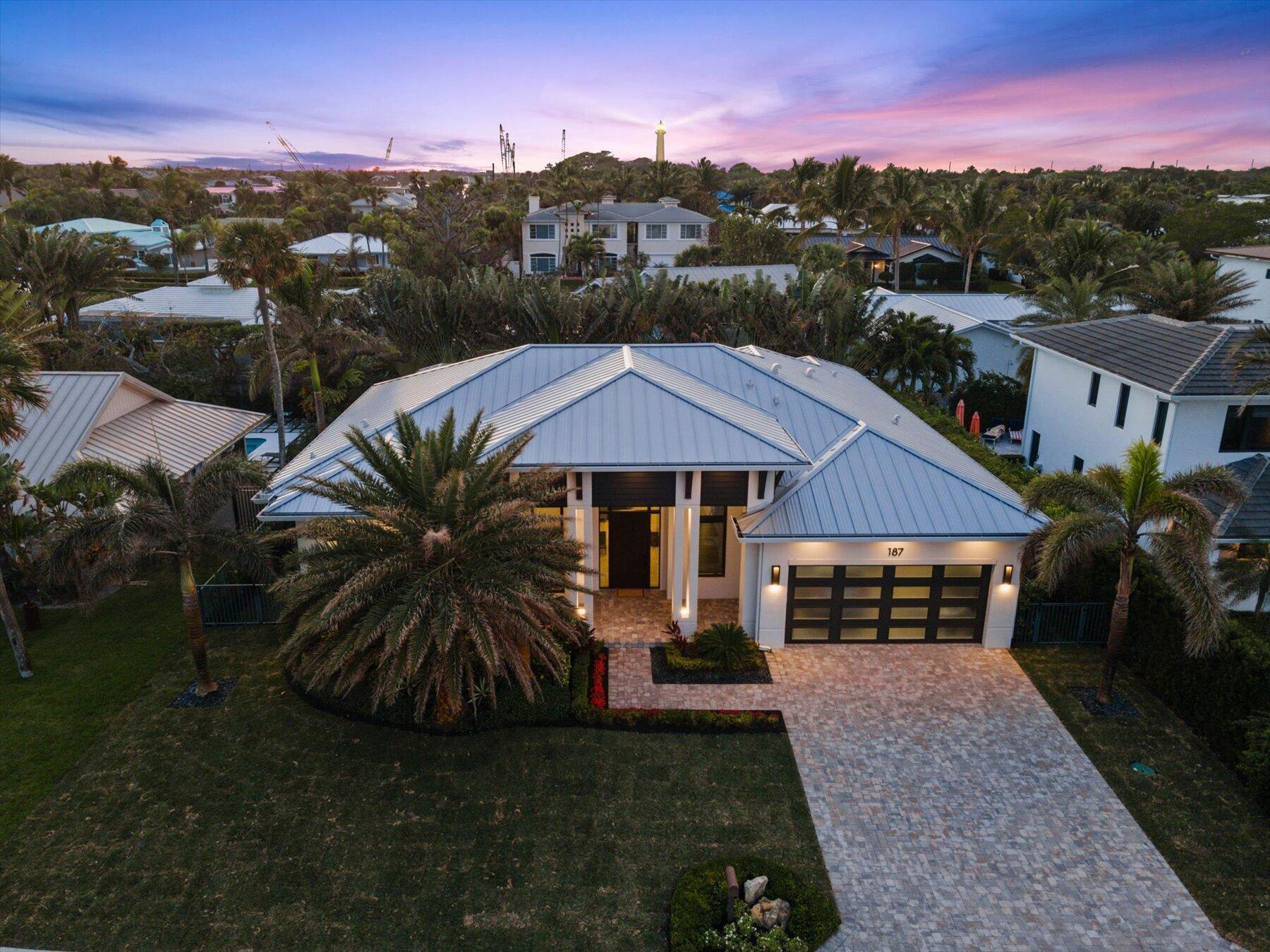 Exquisite single-story pool home, meticulously constructed in 2020 within the prestigious enclave of Jupiter Inlet Colony.   This transitional residence boasting 3 bedrooms, an office (or potential possible 4th bedroom), 3 baths, a spacious 2-car garage.   Great open floor plan with plenty of natural light, lots volume ceilings and cove & LED lighting; and porcelain tile throughout.  The open kitchen with large island is perfectly positioned for entertainment and includes Thermador appliances, gas range, custom cabinetry, and quartz counters.  The living room showcases a stunning entertainment bar with coffee maker, wine fridge and sink providing a seamless blend of functionality and style while hosting.  [see supplement] A master suite featuring his and her California closets, a double vanity, double water closets, a luxurious standalone tub, and an oversized his and her shower complete with a rain head. Rest easy knowing that this solid CBS home is constructed up to the latest code and features hurricane impact windows and doors, providing you with peace of mind during hurricane seasons.
Indulge in breathtaking views from every room, overlooking the tranquil backyard adorned with lush landscaping, including towering palms, verdant hedges, synthetic turf, and a captivating salt-water pool/spa. Immerse yourself in the serenity of this outdoor oasis, where beauty and relaxation converge for your ultimate enjoyment. 

Situated on the southern tip of Jupiter Island in one of the safest towns in America, all homes have direct access to the secluded beaches. Surrounded by the Atlantic Ocean, Intracoastal Waterway and The Jupiter Inlet, Jupiter Inlet Colony is Jupiter Island's best kept secret. It offers its residents a spectacular lifestyle with amenities such as, secluded &amp; pristine beaches, great fishing &amp; snorkeling, optional Beach Club membership, private marina &amp; yacht club, &amp; proximity to world class shopping.  Don't miss out on this world class property. Schedule your private showing today.