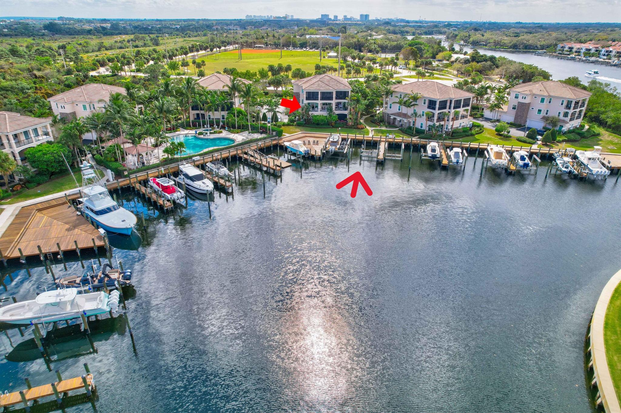 Waterfront living at its finest! Located on the 2nd floor, enjoy spectacular views of the Intracoastal waterway from the expansive private balcony with access from the Living/Dining rooms and Master Suite! Steps to your own Private dock on deep water with a 17,000lb boat lift. Slip is 22' wide and can accommodate up to a 65 ft. vessel. A boater's dream! Ocean access, no fixed bridges & just minutes to PB Inlet & Jupiter Inlet. Great for entertaining, this spacious open floorplan offers a beautiful chef's kitchen boasting high end professional appliances by Wolf, Sub-Zero, and Bosch, custom cabinetry, white quartz countertops, an oversized island, wine fridge & custom lighting. Beautiful hardwood & marble floors throughout! The Master Suite features custom limestone shower & a Jacuzzi tub. This home also features volume ceilings, electric phantom screens on the main balcony, impact windows and doors, a private elevator and 2-car private garage with epoxy floor. 
Frenchman's Harbor is 24hr manned gated community conveniently located close to fabulous shopping and restaurants, golf and pristine beaches. Close to I-95, the Turnpike and PBIA.