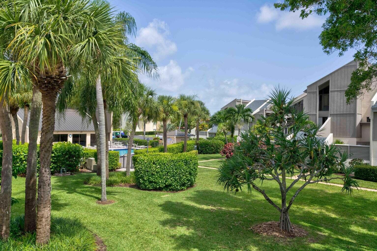 Whether you are looking for the Summer only or for an Annual stay, this 2-beds 2-baths condo has so much to offer! The extra large balcony is PERFECT for al fresco dining and stargazing while enjoying the peace and serenity of the lush garden and the pool area. Situated only STEPS away from famous surfing and kite surfing beaches, in the heart of renowned Jupiter, the interior of this condo offers volume ceilings and a comfortable, open concept, loft-style layout. Surrounded by Nature Conservancy protected beaches and Parks, and steps away from glamorous Restaurants and island flavor Tiki Bars, this fully furnished condo by the beach is available on April 1st.