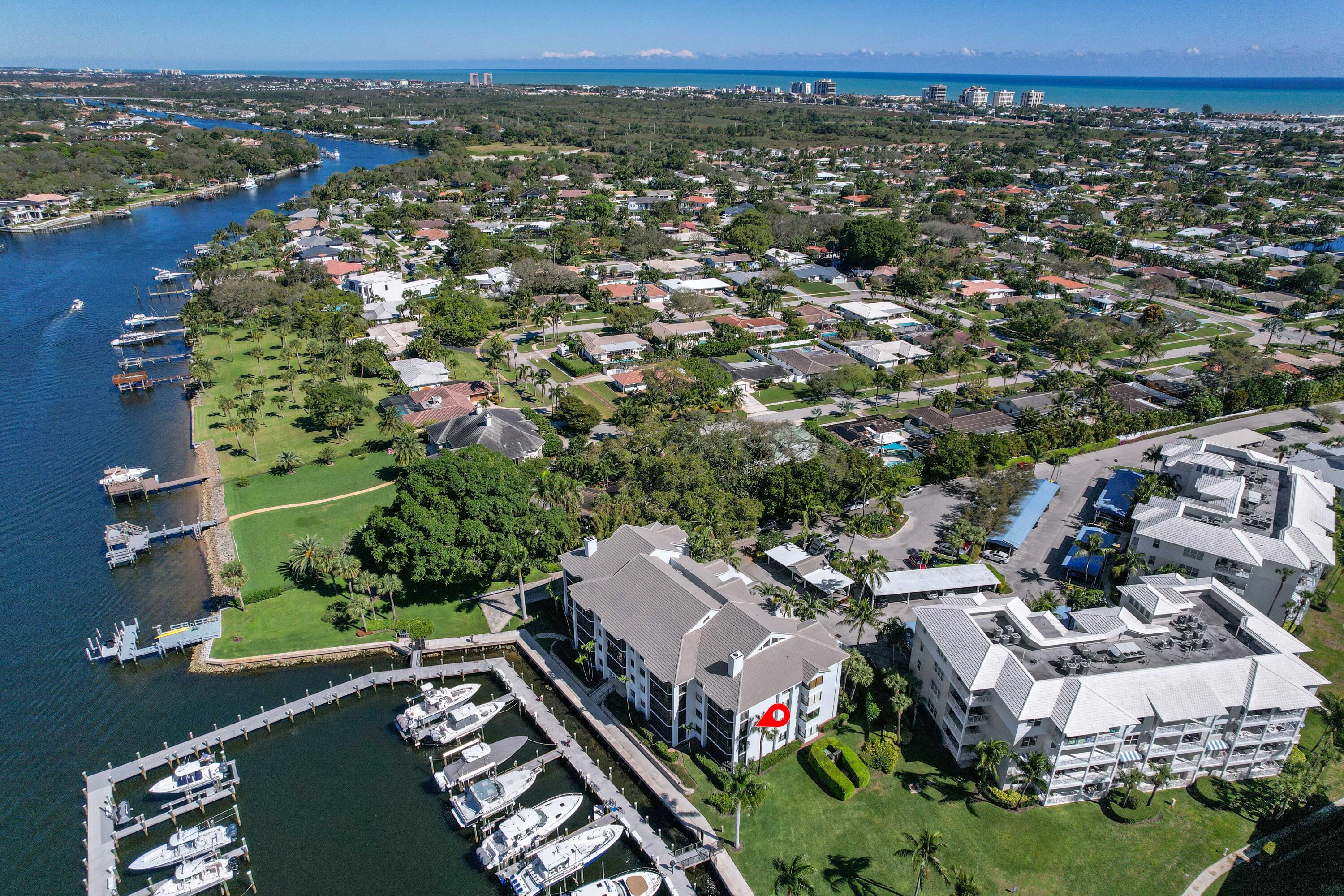 Discover coastal living at its finest! This Juno Beach condo offers 3 bedrooms, 2 bathrooms and 1600 square feet of living area. Located on the intracoastal, just minutes from the beach, this end unit offers breathtaking views. Enjoy a resort lifestyle with access to a fitness center, clubhouse, Pickleball, Tennis, Bocce, Firepit and a sparkling pool & spa. Experience the pinnacle of waterfront living with unparalleled amenities. Revel in the seamless flow of tile flooring throughout, complemented by the southern exposure bathing the end unit in natural light. The custom kitchen cabinetry adds a touch of sophistication, while plantation shutters grace every window, providing both style and privacy. Your dream coastal home awaits. Boat Slips avail for purchase or lease.