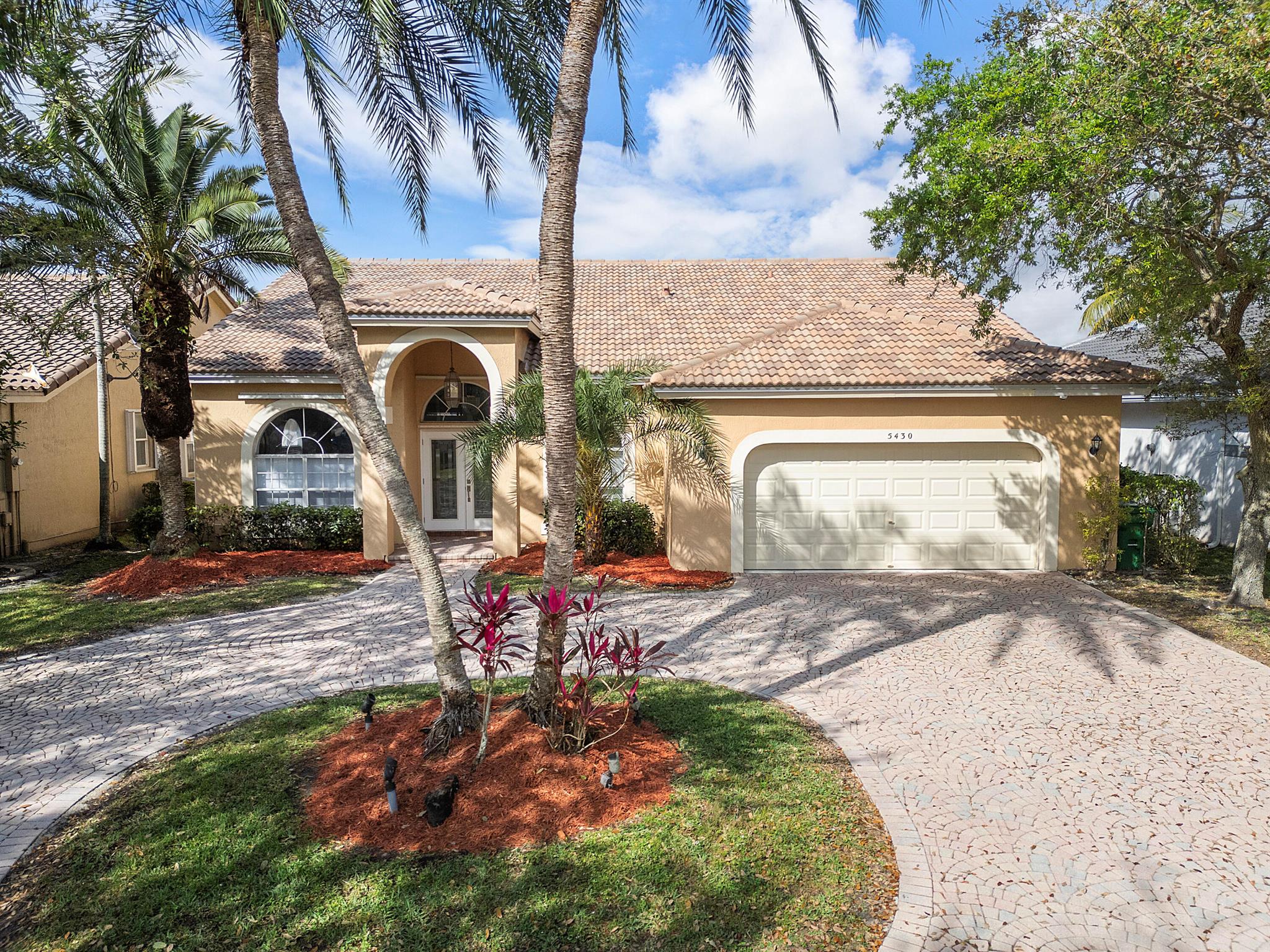 Stunning 4 bedroom Oasis with Lake Views & Modern Updates in Coral Springs, FL. This property offers renovated kitchen and bathrooms, breathtaking lake views, screened patio, and a generator that powers the entire home. This home also features new flooring throughout and was recently painted, as well the roof & AC was updated in 2018.