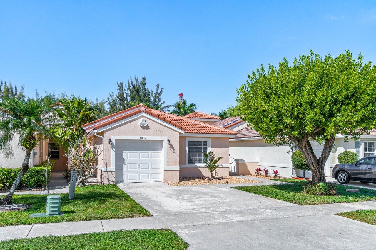 7039 Burgess Drive, Lake Worth, FL 