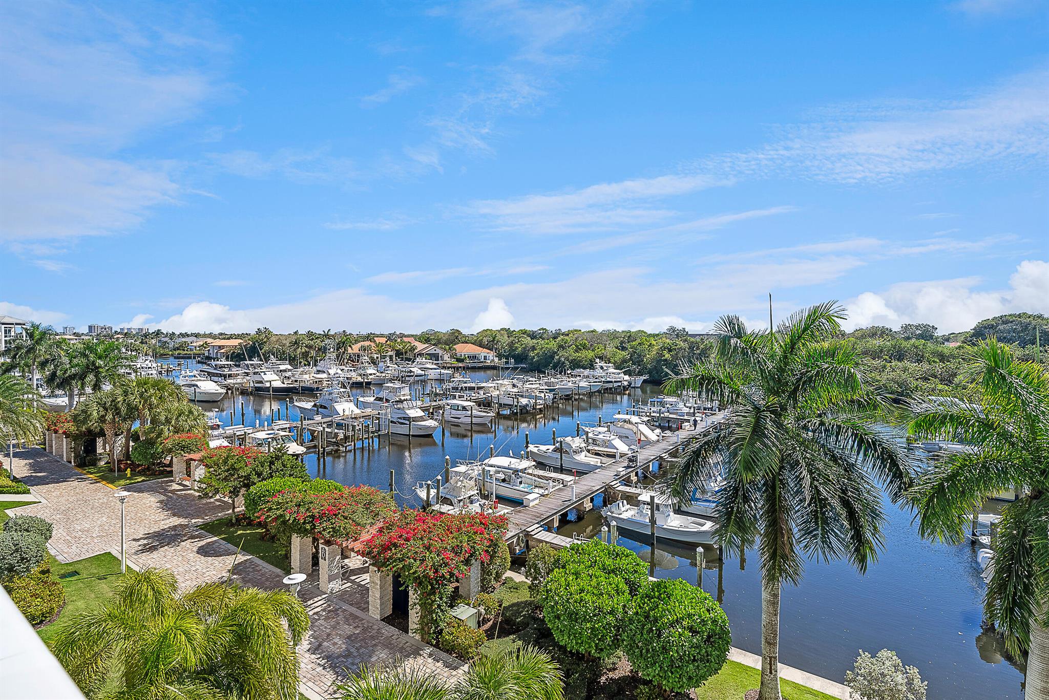 Direct marina views rarely available! Enjoy relaxing sunrises & sunsets with marina views just moments from the Intracoastal & blue water beaches of Juno Beach. Coupled with the state-of-the-art concierge services you'll understand the allure of the Azure. Relish in this elegantly furnished home (some exclusions). Step from your privately keyed elevator to an open floor plan with plenty of natural light. Custom built-in family room feature wall, & an office that can double as a 3rd bedroom. 24/7 manned gate, full-service hurricane safe marina with dockage, fitness center, heated pool/spa, lockers & sauna, private climate-controlled wine room, business center, club/card room, putting green & golf simulator, & indoor parking protects the finest of automobiles with 2 assigned parking spaces.