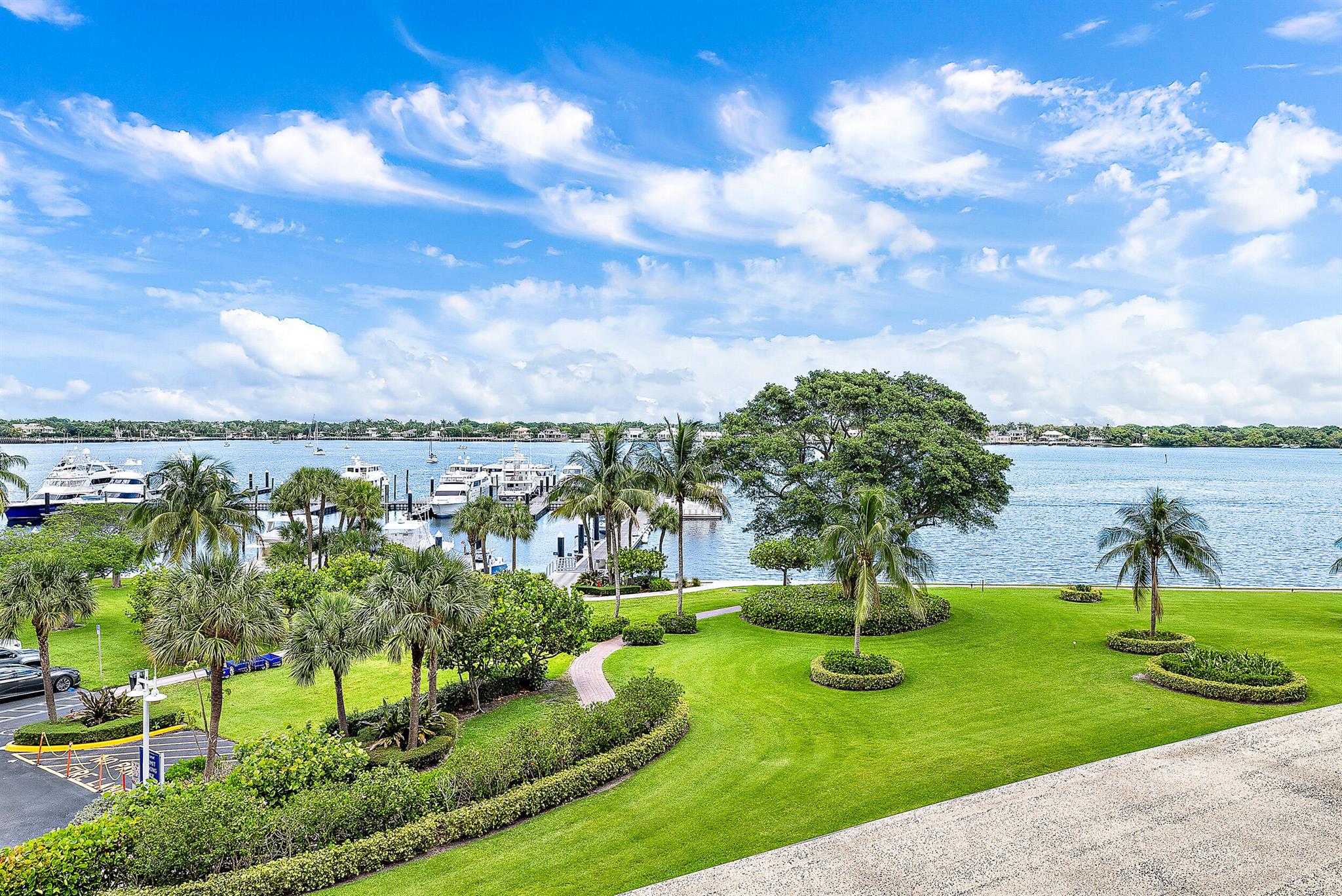Enjoy stunning views of the intracoastal waterway through floor to ceiling sliding glass windows. The spacious living room opens up to a large balcony perfect for enjoying your morning coffee or evening cocktail while watching the boats go by.  The updated floors, kitchen appliances, quartz countertops, and backsplash will give the space a fresh and modern feel. With walls removed for a more open feel, this condo has been completely transformed into a spacious and airy living space. And the completely remodeled bathrooms will provide a luxurious and spa-like experience. Quay North at Old Port Cove is secure & gated. The community offers its own restaurant and marina as well as a heated pool with sauna, showers and a fitness center. Stay fit with 2 miles of walking paths along the water marked in 1/4 mile increments with rest stops along the way. You can take advantage of the beautiful nearby North Palm Beach Country Club with a Jack Nicklaus designed golf course, pool, tennis courts, pickleball and restaurant/bar. Multiple pristine beaches and ocean front parks are nearby as well as world class shopping including the Gardens Mall, Downtown at the Gardens, Legacy Place and Worth Avenue in Palm Beach. You'll never run out of amazing restaurant choices. Palm Beach airport is less than a 20 minute drive.