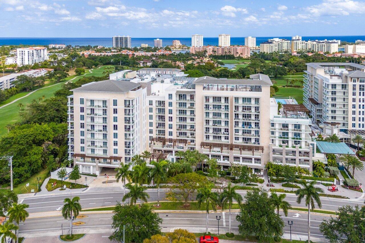 Exceptional luxury condo in the prestigious Alina Residences in downtown Boca Raton. Elevator opens into a private foyer leading to Unit 703, 4,579 sq ft w/4 bedrooms + a den & 5.5 baths. Beautiful, exquisite finishes, 24' x 48' porcelain floors, tall ceilings, European-style kitchen, quartz countertops, Miele appliances & wine refrigerator. Primary bedroom suite has two custom walk-in closets; a bathroom featuring dual vanities, 2 spacious showers & soaking tub. East-West flow, floor to ceiling sliding glass doors open to expansive terraces w/amazing golf course & city views. The Alina Residences is a guard-gated development, offering remarkable amenities: his and her spas, rooftop pool, fitness center, concierge, valet, & more. Elevate your living experience in this luxury haven.