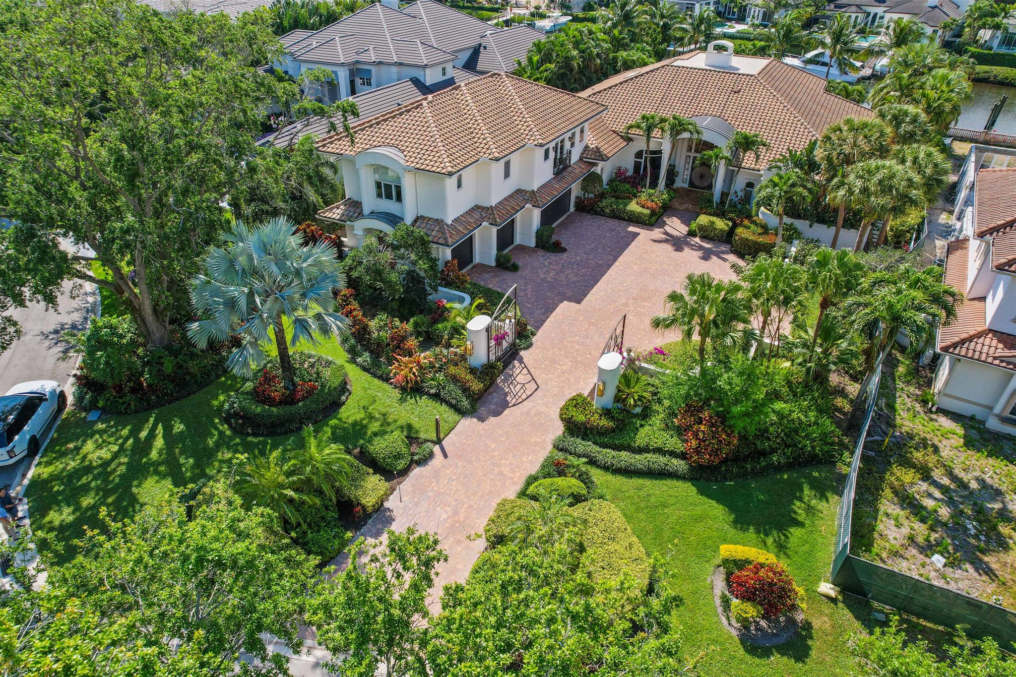 Welcome to your slice of paradise in Admirals Cove!Immerse yourself in the lap of luxury along the enchanting oak-lined streets of Admirals Cove, where this waterfront marvel awaits. With its coveted Southern Exposure and an impressive 119 feet of water frontage, this gem promises a lifestyle of unparalleled bliss.Picture yourself just moments away from the Intracoastal Waterway, nestled on a sprawling .62-acre estate lot primed for either a stunning renovation or the creation of your dream home. Opportunities as extraordinary as this are a rare find within the exclusive confines of Jupiter's most sought-after waterfront community, but now, the chance to indulge in the finest things in life is within your grasp. Perched on one of Admirals Cove's most esteemed streets, this concrete block sanctuary boasts 7 bedrooms, 7.1 bathrooms, and nearly 6300 square feet of luxuriously air-conditioned living space. Step outside and be greeted by the inviting beach entry pool, setting the stage for outdoor gatherings amidst lush surroundings. Revel in the pleasures of outdoor living with a covered summer kitchen, a delightful putting green, and a Trex dock capable of accommodating an 85-foot yacht.
But that's just the beginning of the extravagance that awaits within The Club at Admirals Cove. Indulge in the club lifestyle with access to 45-holes of championship golf, a premier tennis club, pickleball courts, state-of-the-art fitness facilities, and a pampering full-service spa and salon. Delight your palate with a choice of seven distinct dining options, explore the marina's 54-slip floating dock, and let your little ones discover endless fun at the kids' club. With an array of resort-style pools beckoning, every day feels like a vacation in this enclave of opulence.
Embark on a journey of refined living where every detail exudes sophistication and grandeur. Seize this extraordinary opportunity to join the ranks of those who relish in the pinnacle of luxury living.
Unlock the gates to an unparalleled lifestyle today. Don't miss out on this exclusive opportunity.

(Please note: $300k Non-Refundable Initiation Fee, $55k Annual Dues Required)
