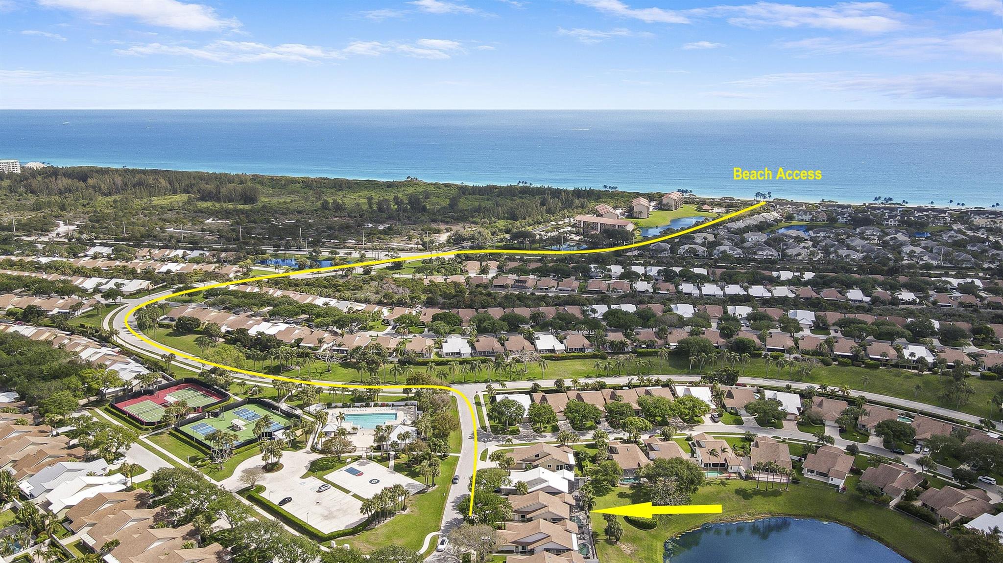 Indulge in coastal luxury at this impeccable 3 bedroom, 2-bath single-family home in Jupiter, Florida! Nestled in a pet-friendly community, this single-story retreat offers the perfect blend of style and comfort. WALK TO THE BEACH or unwind in the SALTWATER POOL with serene LAKE views from your backyard oasis. Solid CBS construction by Divosta Homes, this home features hurricane impact windows & sliding doors, vaulted ceilings, and a 2-car garage. The Ridge at the Bluffs consists of 618 single family homes within walking distance to the ocean! Community amenities include: a beautiful swimming pool & children's wading pool, three tennis courts, pickleball courts, children's playground and a basketball court. Sidewalks are covered by lush oak trees and tropical landscaping.