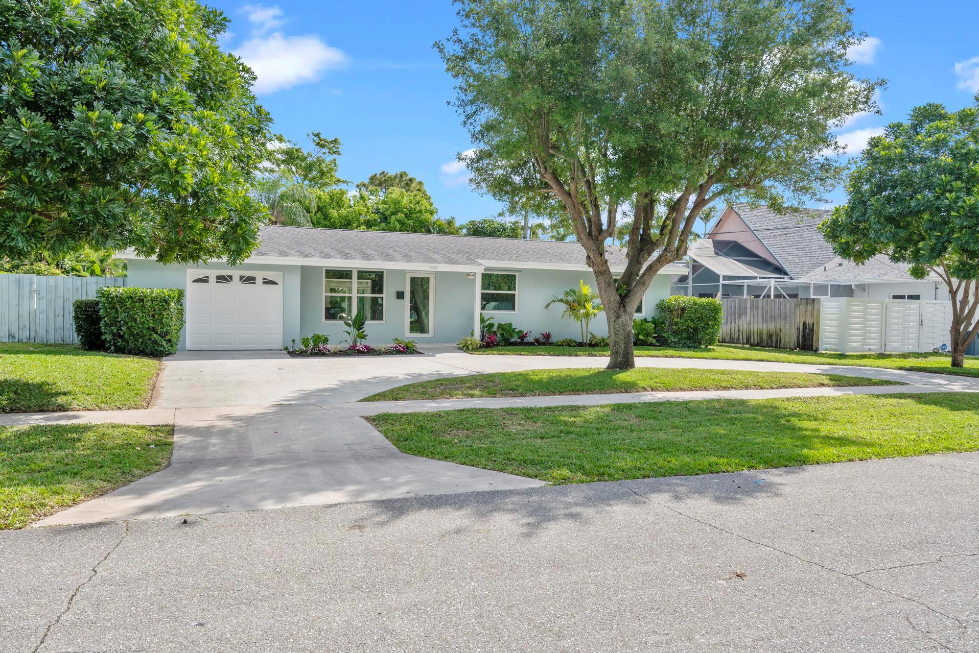 Renovated to Perfection! This North Palm Beach home features a new kitchen with a custom hood, hurricane windows (2024), and LPV flooring. Enjoy the resurfaced pool deck and covered porch for outdoor entertaining. Ideal location near beaches, dining, and top schools.