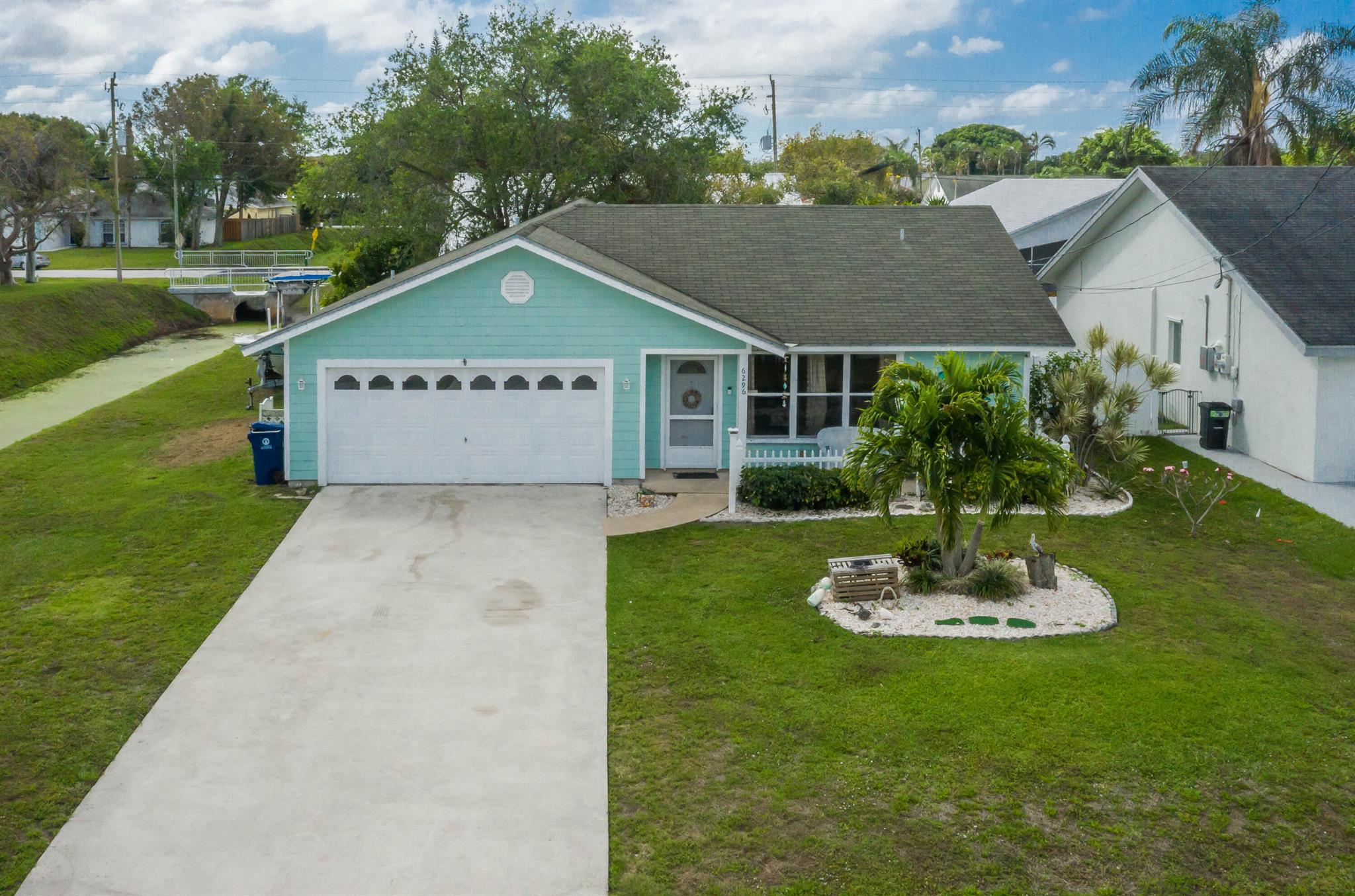 Assumable Mortgage of $260k with a great locked in rate. Prime location in Jupiter Florida alongside a Canal that allows for boat or RV storage.  The Heights in Jupiter, FL is known for its holiday themed streets and family oriented neighborhood.  The Non-HOA neighborhood has its own recreation park with excellent rated schools in Jupiter.  Less than 5 miles from the beach and a golf cart ride away from Abacoa Towncentre, Roger Dean Stadium and Abacoa golf course this location is pristine for all age groups.  PVC fenced in back yard to bring your pets or enjoy some outdoor privacy.  The home includes shutters for hurricane protection and to maximize your insurance deductions.  Blown in insulation added on top of existing insulation in the attic to bring down energy cost.