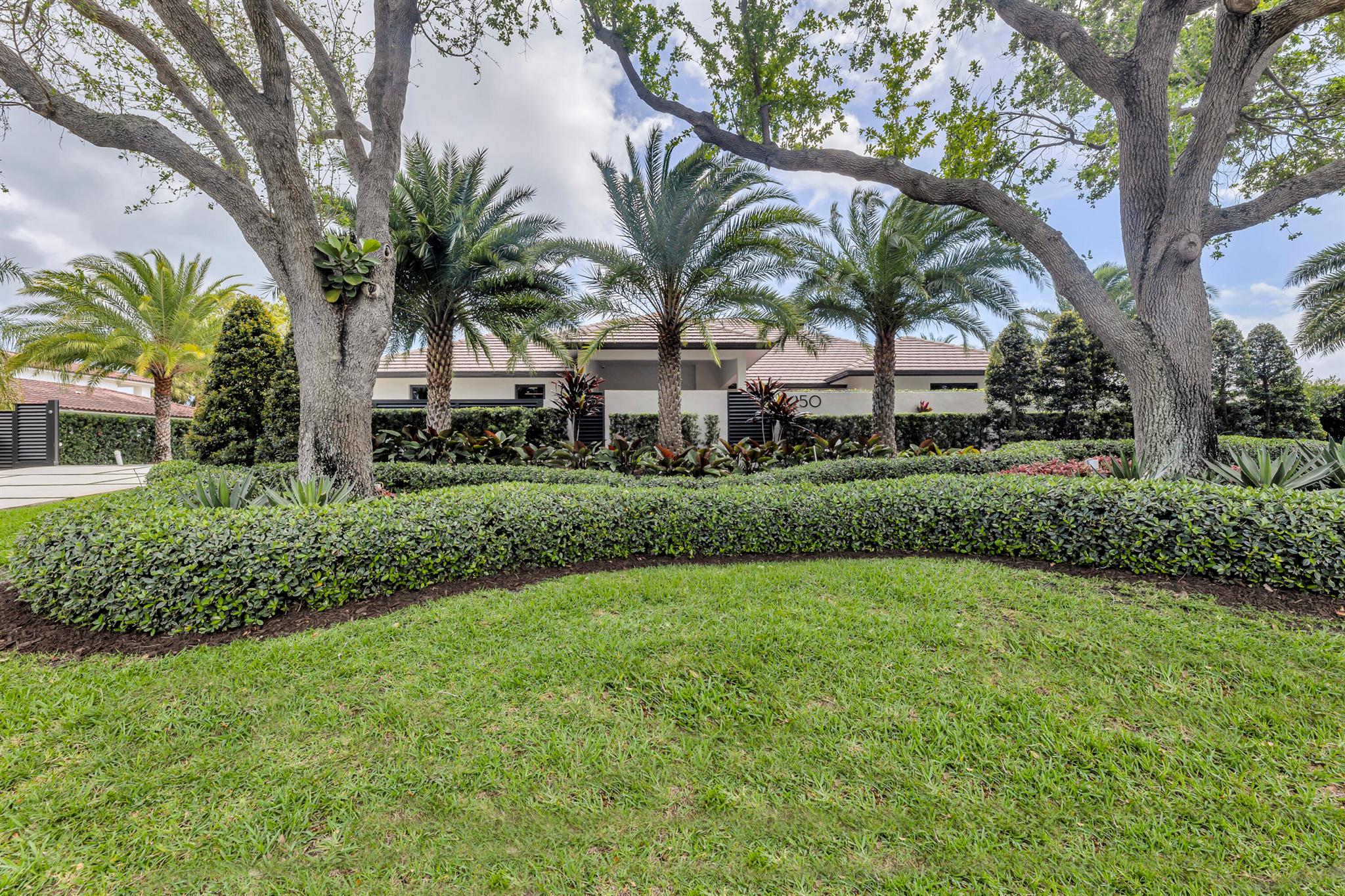 Introducing this exquisite family home on enormous 1/2 acre directly on the prestigious Coral Ridge Country Club Golf Course. This modern and elegant residence offers a perfect blend of luxury and convenience, providing an ideal setting for entertaining and a top-of-the-line security system for peace of mind. This stunning home features 5 bedrooms, 4 bathrooms, and a spacious 3800 square feet of living space, situated on a total lot size of 20589 square feet. The property is centrally located to Cardinal Gibbons, Pine Crest, and West Minister Academy, ensuring accessibility to renowned educational institutions. Upon entering, you are greeted by a wealth of amenities newly updated and beautifully appointed. The property boasts a full house generator, a new AC system, (more)