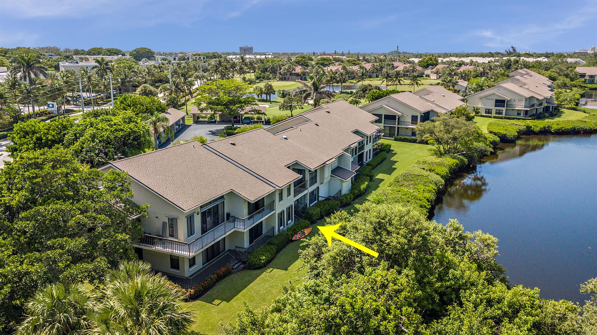 Paradise!  Beautifully renovated 1st floor, 2 bedroom/2 bath residence located in the golf & beachside community of Jupiter Dunes. Enjoy amazing water views of Jupiter's natural estuary, constant sea breezes & the sound of the ocean from the waterfront deck.  Launch your paddleboard or kayak from the backyard & cruise to the Jupiter Inlet or enjoy a fun round of golf on the challenging 18 hole, Par 3, Jupiter Dune's ''Little Monster''.  This special offering features: renovated kitchen w/quartz ctops, SS appliances, white Shaker cabinetry, bar seating; wood plank tile flooring; 2 renovated baths; waterfront flex room; deck; storage closet for beach toys & bikes; covered carport. Steps to the beach, golf, shops & waterfront restaurants.  A perfect beach retreat. Come live at the beach!