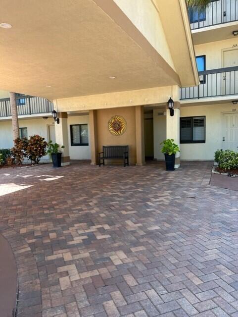 Do yourself a favor and see this lovely 3rd floor end unit which has wonderful panoramic views of the lake and marina with luxurious yachts . Walking distance to the ocean , intracoastal water way , county parks , shopping and restaurants . Many other amenities .Balcony access has hurricane impact resistant sliding glass doors . Community has four (4) heated swimming pools ; well maintained tennis courts ; bocce ball ; outdoor grills along with picnic grounds overlooking the intracoastal waterway .