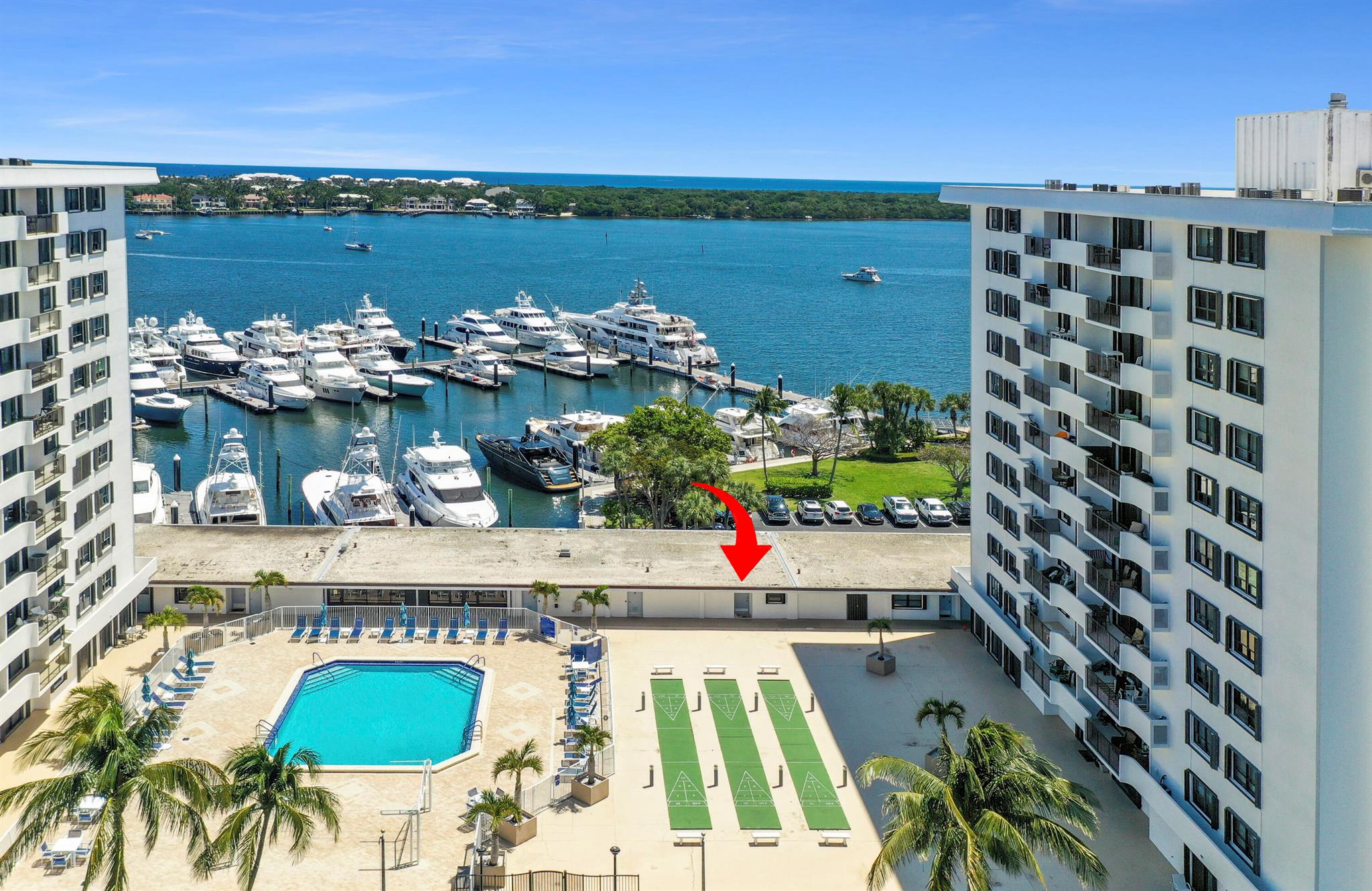 Priced For Quick Sale! It's all about the view & this marina view Garden Unit is marvelous!  This 1/1 in prestigious Old Port Cove is on the pool deck floor & has no one above or below making this unit unique in condo living. It is the closest to the heated pool, sauna & club room.  Unit features an oversized 240 Sq ft balcony with marina and intracoastal views, stainless steel appliances, granite counter tops, lots of storage including a walk in closet,  accordian hurricane shutters & new paint. Community also includes 24 hour manned gate, reading/game room, 2 mile walking path, tennis and community laundry.   Washer/dryer is allowed to be installed in unit.  Fees include cable, internet, water, trash, sewer, manned gate.  Nearby pristine beaches, shopping, entertainment and 20 min to PB